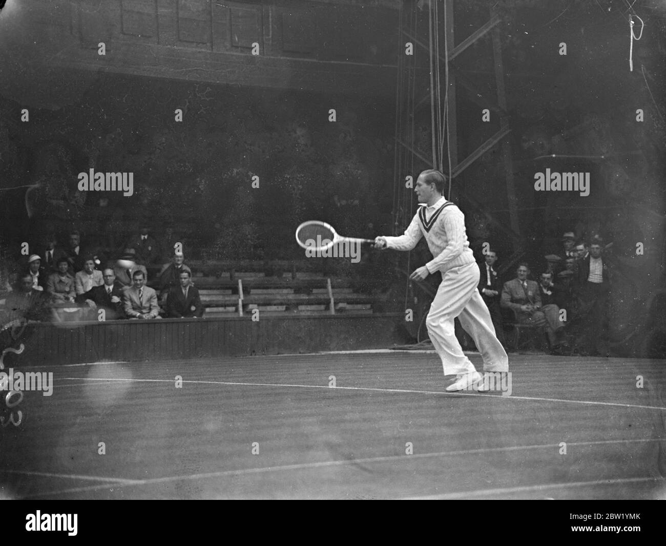 Baron von Cramm in play in Wimbledon Championships. Baron Gustav von Cramm of Germany met J F G Lysaght on number one Court in the first day's play of the Wimbledon tennis championships. Photo shows, Baron von Cramm in play. 21 June 1937 Stock Photo