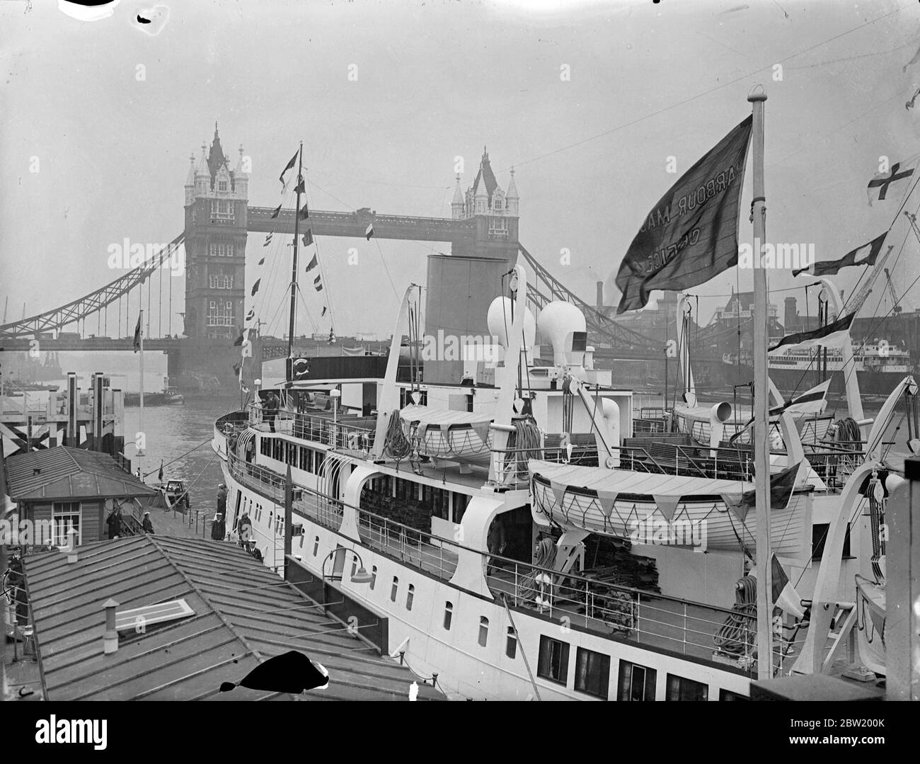 The Royal sovereign moored at Tower Pier the 20-knot twin-screw motor vessel was on view for the public to see. The ship was built for cross channel services of the New Medway Steam Packet Co. LTD. Which one day will make it to the continent. 13 July 1937 Stock Photo