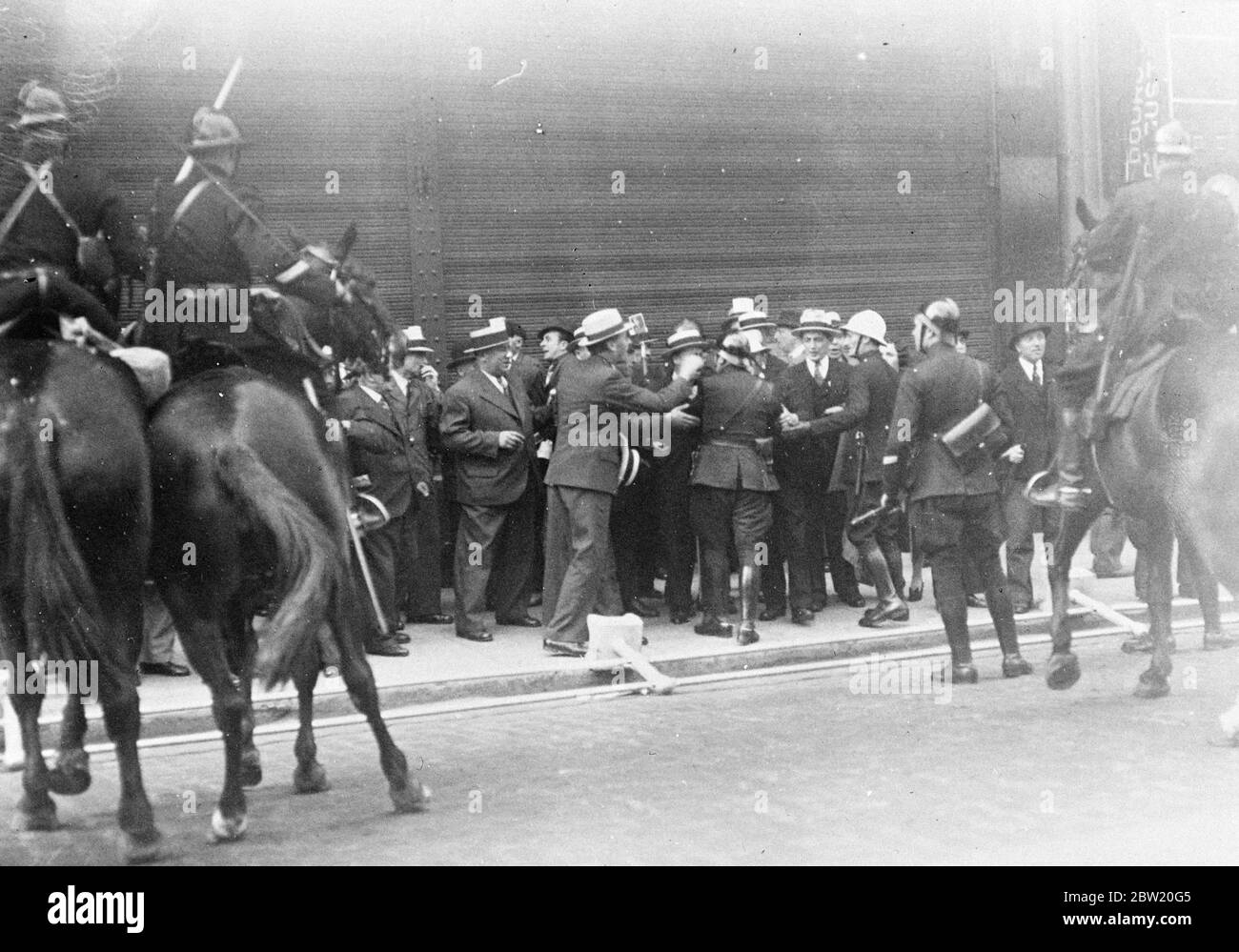 Many injured in Brussels riots. Police clash with war veterans. Fierce fighting broke out in Brussels when 15,000 ex-servicemen and war widows marched through the streets to demonstrate against the granting of an amnesty to Belgians condemned for aiding the enemy during the German occupation in the war. The fighting occurred when war veterans try to break the lines of police guarding a 'neutral'zone surrounding Government offices. Many police and demonstrators were injured. Demands were made for the resignation of the Government and 400 ex-soldiers lay down on the pavements in front of the Roy Stock Photo