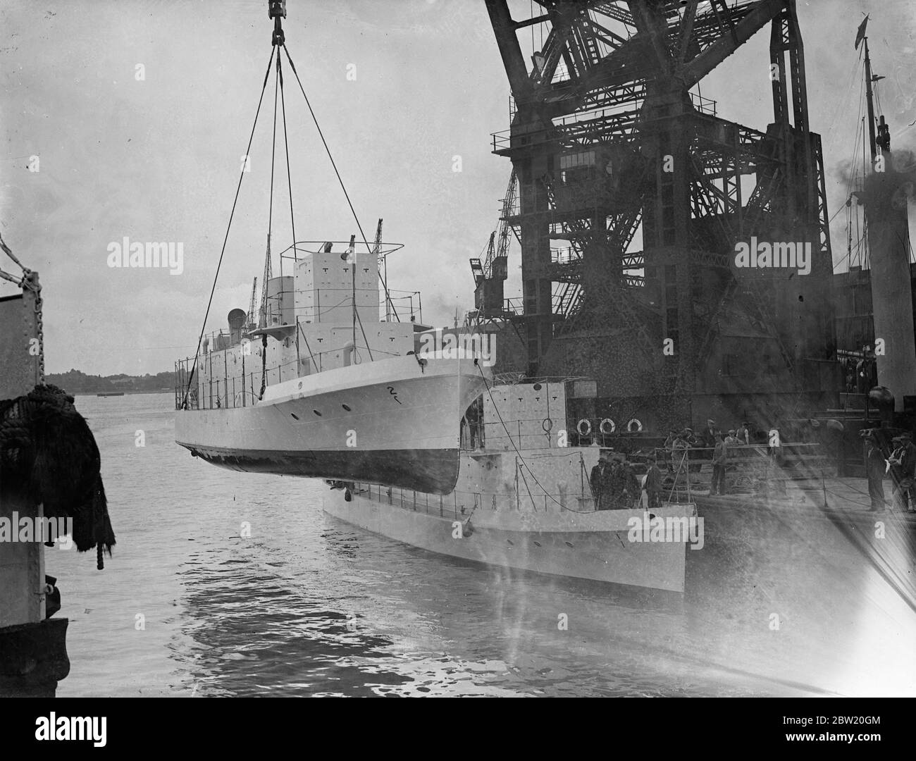 Three patrol launches, weighing 65 t each, where loaded on the Armiston at Southampton for Baara. They have been ordered by the Irak [Iraq] Government and would be used for patrol duties. 1 July 1937 Stock Photo