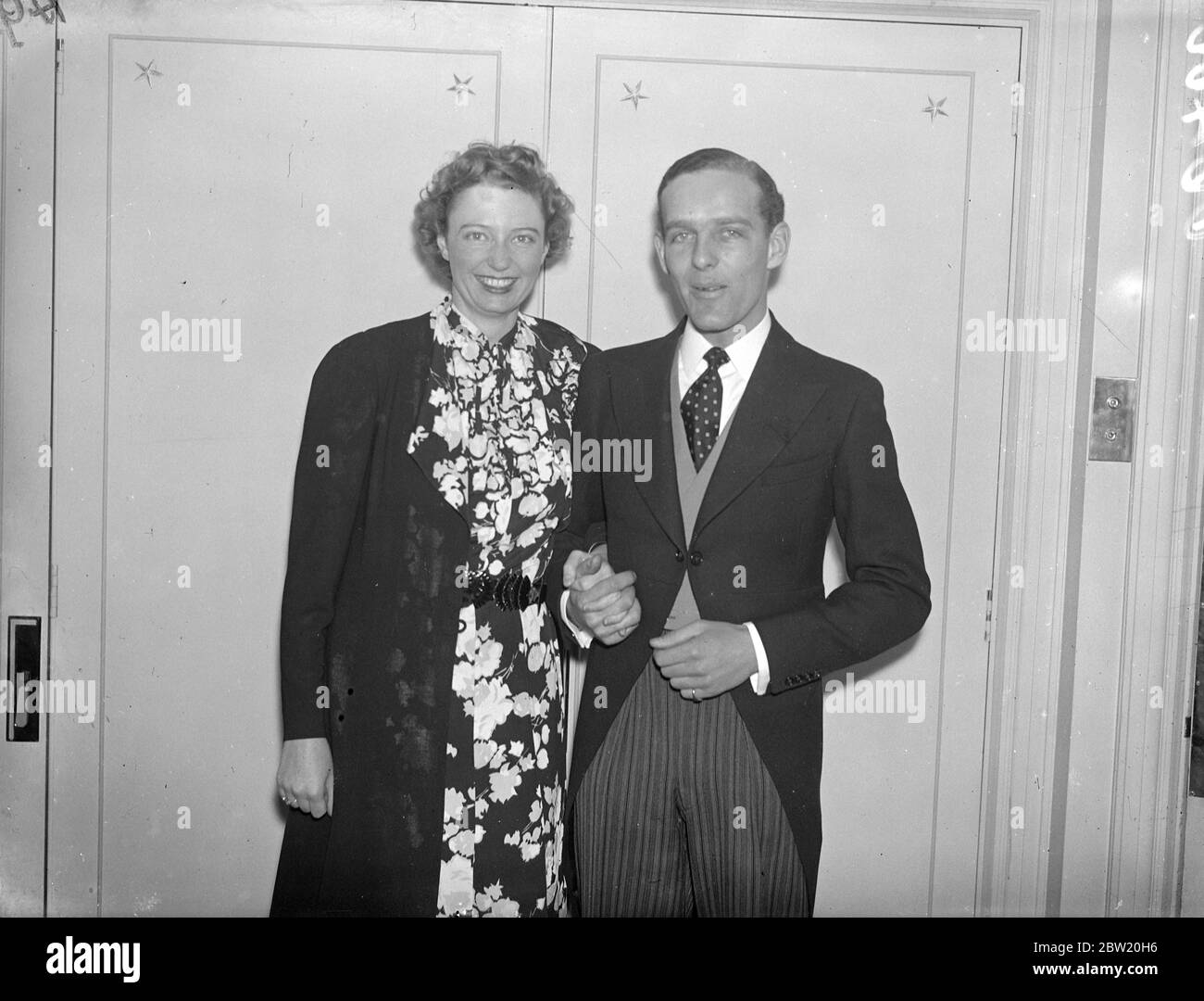 After heavy had the baldness to propose marriage at the Bachelors' Club - and to be accepted there - Mr Robert Arbuthnott Hunter, 26-year-old Oxford graduate, solicitor and man-about-town, will be married in London next week to Miss Melanie Grant, aged 23, daughter of Mr and Mrs William Grant of Denver, Colorado, USA. A marriage fine of two Guineas still exist for members of the Bachelor's Club although the club has so far broken with tradition as to have a women's annexe. In the past, a member of the Club who got married had to suffer loss of membership and Â£100 fine. 10 July 1937 Stock Photo