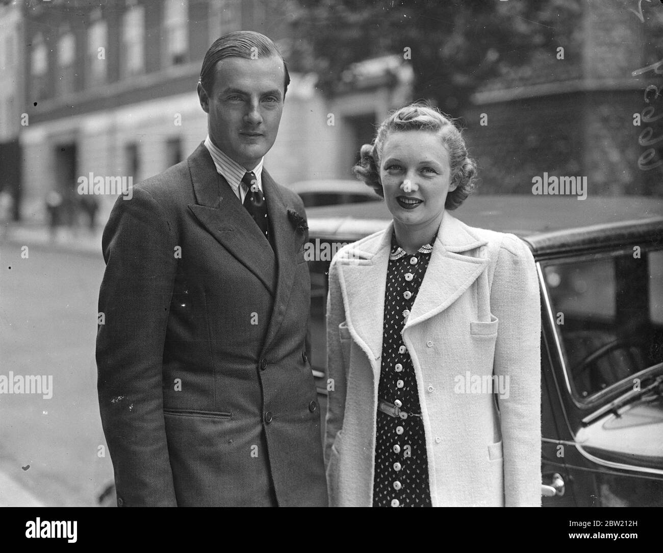 The Earl of Jersey, whose wife's divorcee was made absolute today (Monday), is expected to marry shortly Miss Virginia Cherrill, the American film actress who won fame as the blind flower girl in Charlie Chaplin's film City Lights. The Earl of Jersey and Miss Virginia Cherrill photographed together in London today. 19 July 1937 Stock Photo