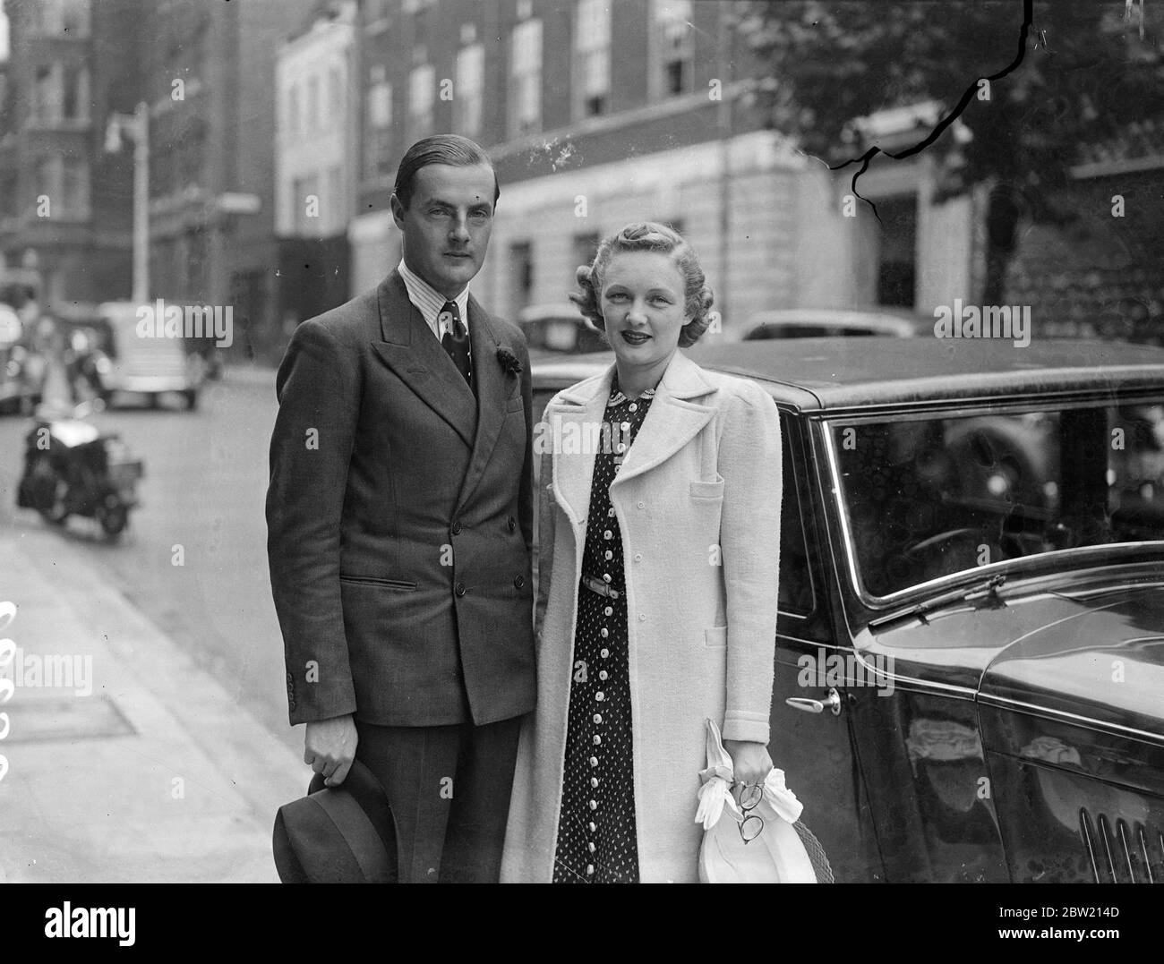 The Earl of Jersey, whose wife's divorcee was made absolute today (Monday), is expected to marry shortly Miss Virginia Cherrill, the American film actress who won fame as the blind flower girl in Charlie Chaplin's film City Lights. The Earl of Jersey and Miss Virginia Cherrill photographed together in London today. 19 July 1937 Stock Photo