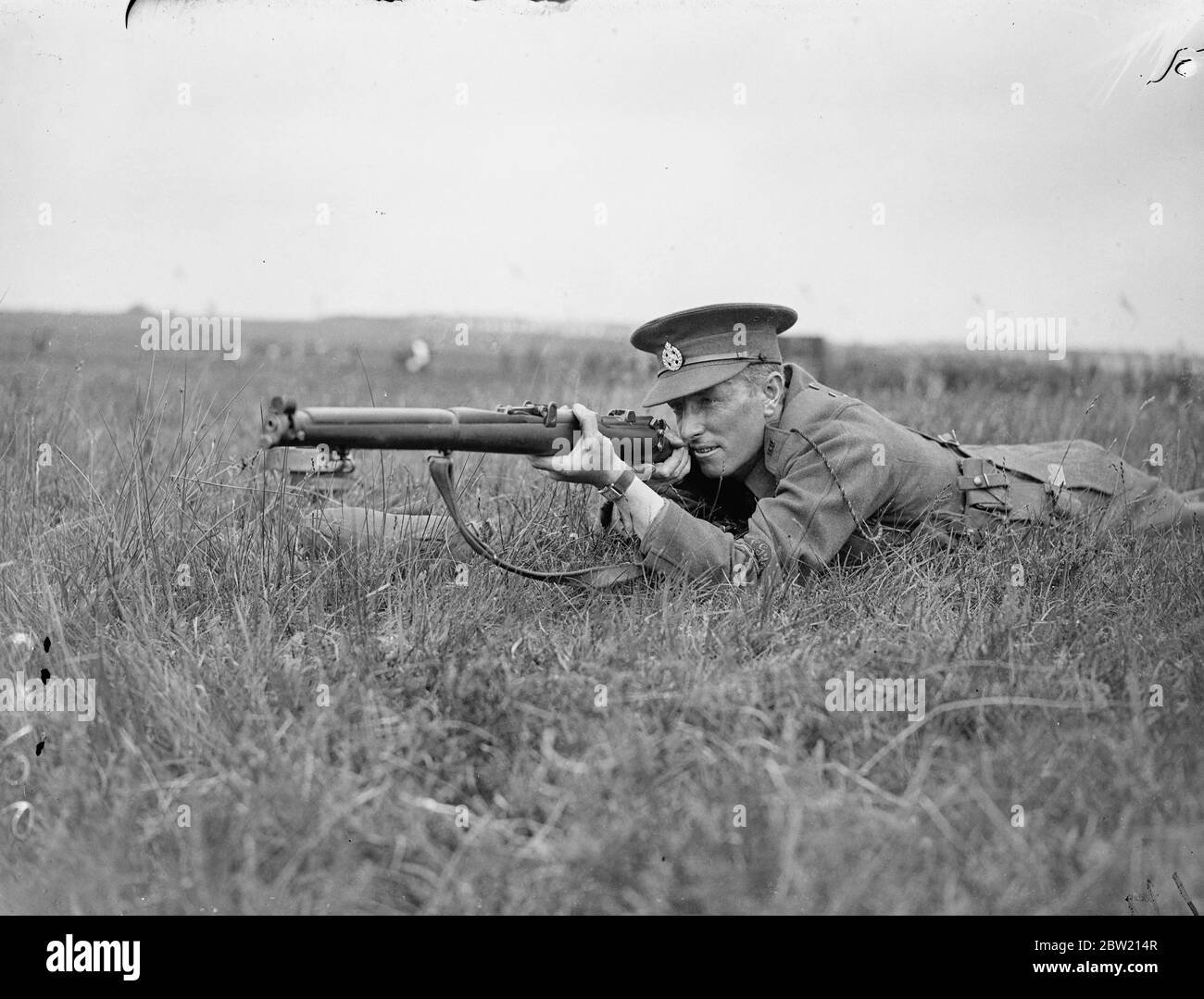 Corporal J. White of the Rifle Brigade won the Army rifle championship at Bisley. He carried off the King's Medal, the Watkin Cup, and the Army Rifle Association's gold jewel. His aggregate of 418 was seven points better than that of the last year's winner. 1 July 1937 Stock Photo