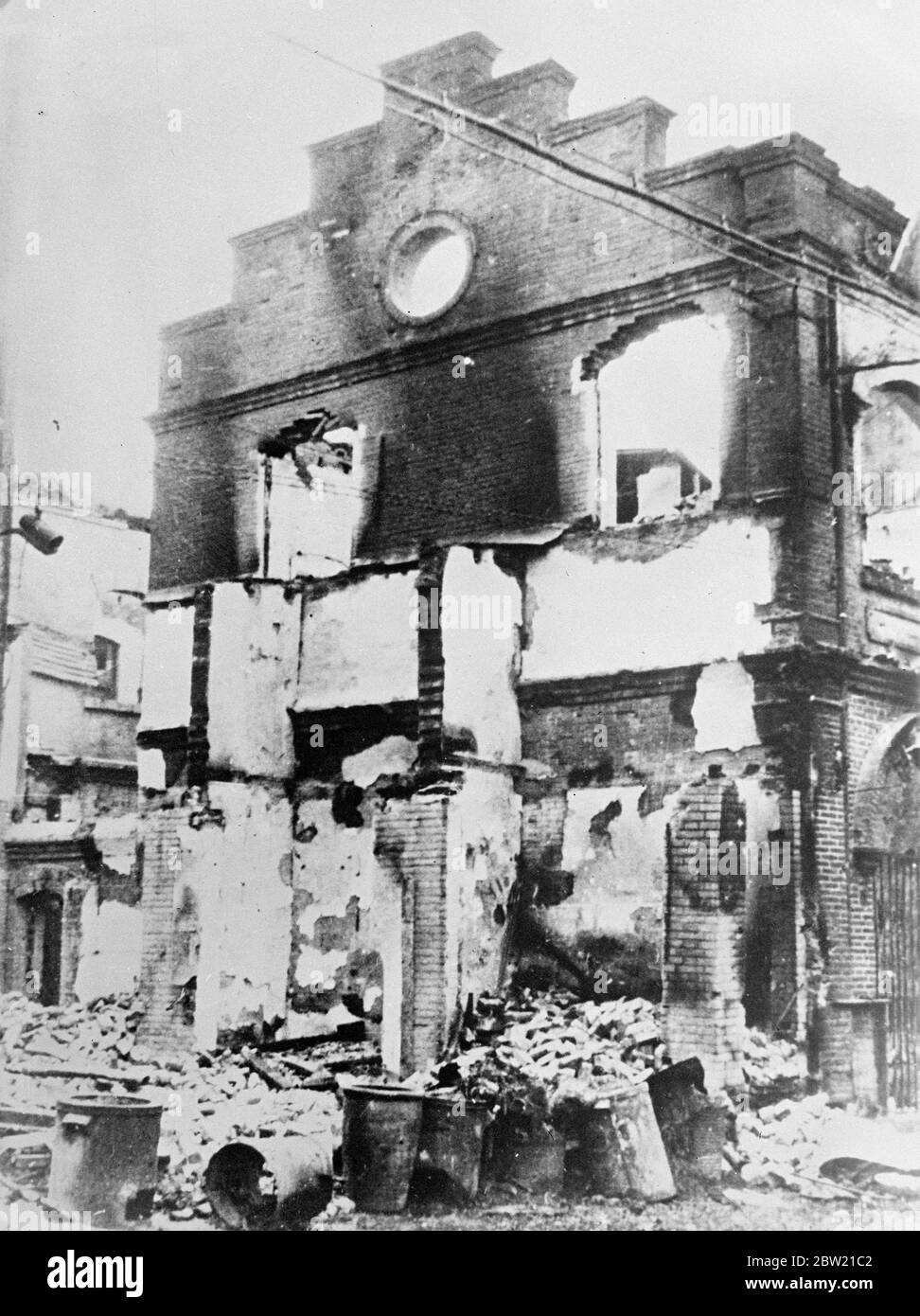 The ruined shell building Tientein which gave the testimony to the marksmanship of Japanese gunners. The fierce fighting which took place there between Chinese and Japanese troops. After Southern resistance by the Chinese took possession of the city when they carried out mopping up operations in the streets. Fighting is still going on in the south of the country. 23 August 1937 Stock Photo