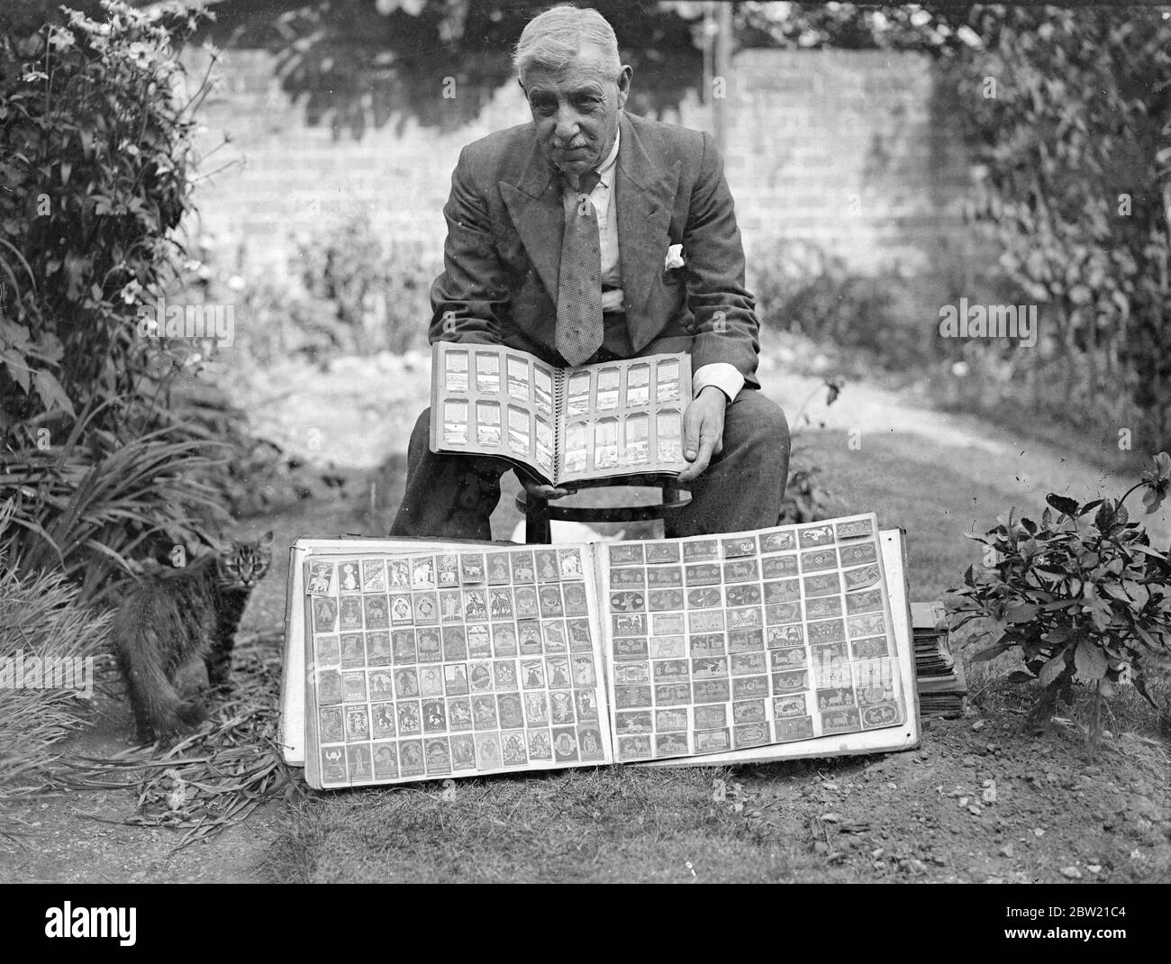 Mr SH Toole with some of his rare matchbox labels at his Southampton home will stop he has collected 15,000 matchbox labels in this 16 years since he commenced his curious hobby in 1921. He is now planning to hold an exhibition of match box-label collections in London. 13 August 1937. Stock Photo