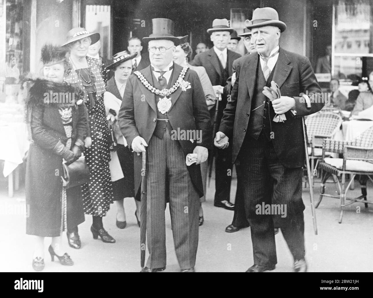 Alderman J Toole, Lord Mayor of Manchester, with Mayor Hedebol of Copenhagen (right) during a tour of the city. The visit of the two mayors is designed to strengthen friendly relations between the countries. After opening a gas works he received a gift of a walking stick from the manager. 6 September 1937. Stock Photo