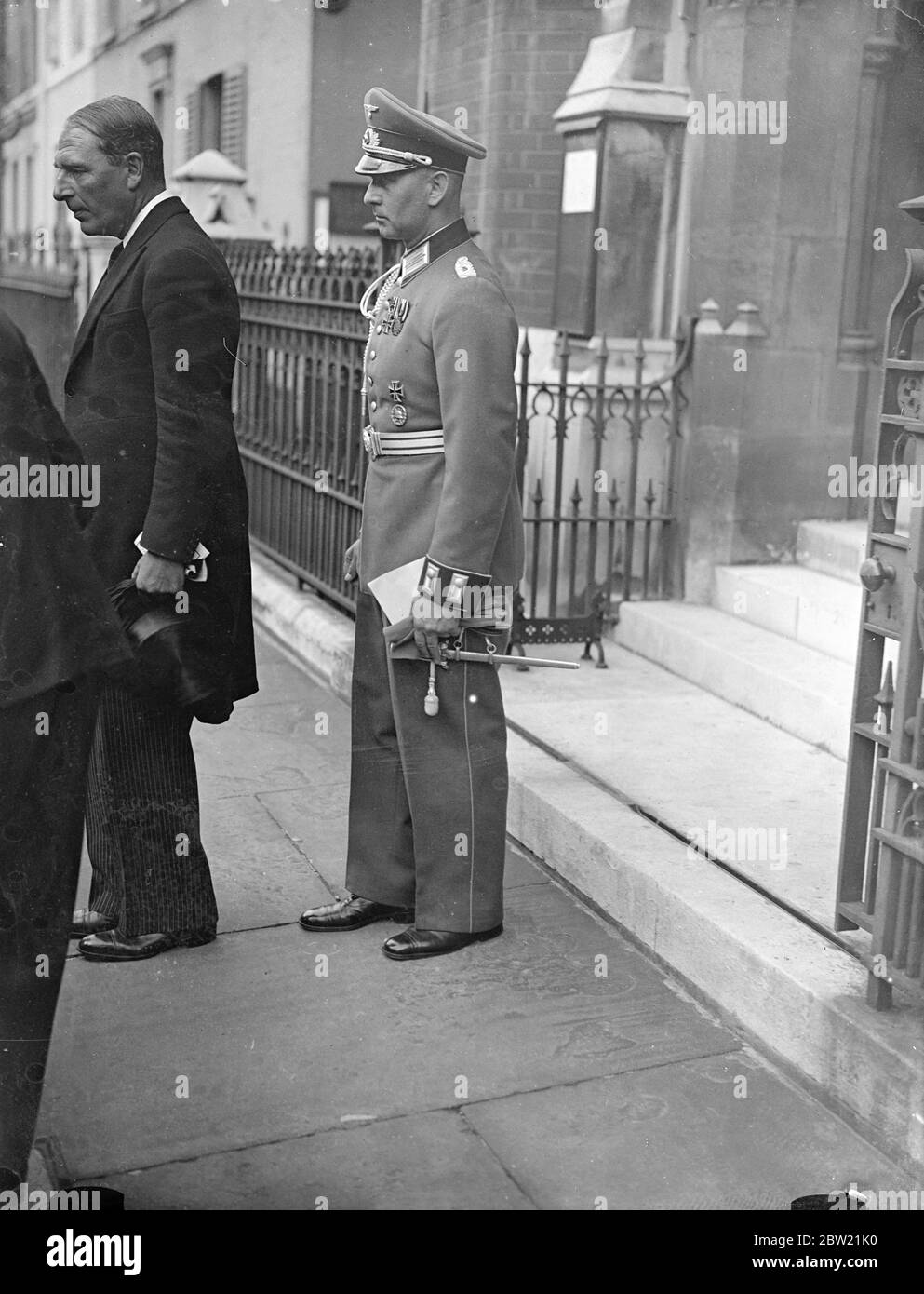 A memorial service for the late Naval Attache to the German Embassy in London, Rear-Admiral Erwin Wassner, was held at the German Lutheran Christ-Church, Montpelier Place. Major Kirschmann, Assistant Military AttachÃ© at the German Embassy, leaving after the service. 3 September 1937 Stock Photo