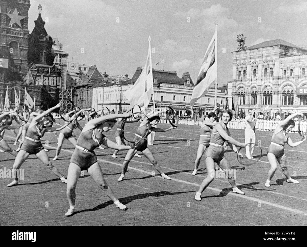 Girl gymnasts of the stormy petrel sports society performing their exercises as they passed through red square, Moscow. Young athletes drawn from all sports society's in all parts of the Soviet Union paraded before Stalin and his chief ministers on the 23rd international youth Day in Moscow. 19 September 1937. Stock Photo