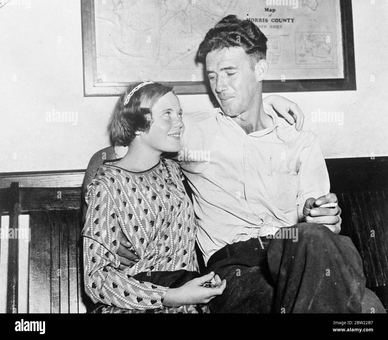 Theodore Slack with his second wife Helen back the state police headquarters, New Jersey. Said to have married a 13-year-old girl six years ago and have failed to to divorce her before second child marriage, the 27-year-old faces charges of becoming. Fact is now married to 12-year-old girl he is also alleged to have served time at the reformatory for housebreaking. 7 October 1937. Stock Photo