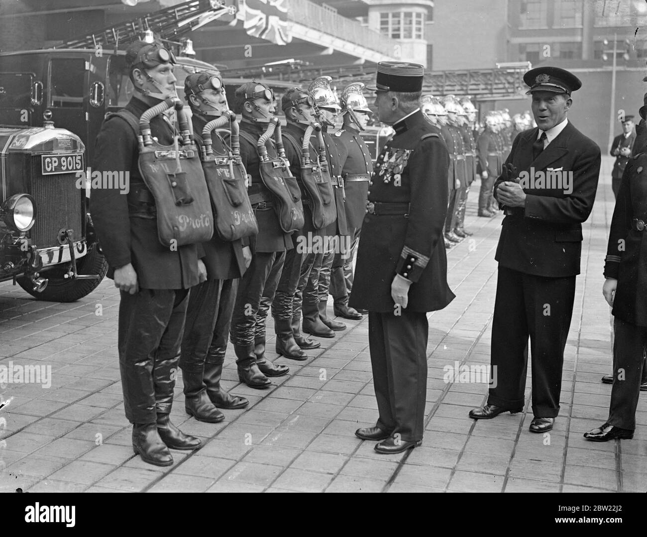 Colonel Islert, chief of the Paris Fire Brigade, who is visiting London to inspect British fire-fighting methods and apparatus, made a tour of inspection at the LondonFire Brigade Headquarters on the Albert Embankment. 24 September 1937. Stock Photo