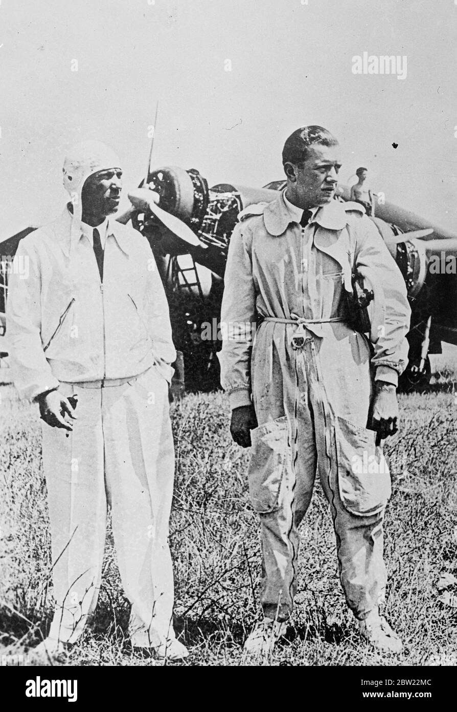Bruno Mussolini (right) with captain Biseo. It is authoritatively learned in Rome that Bruno Mussolini 20-year-old son of the Duce and miscellaneous personal pilot of fighting in staying. Their base is at Majorca, with other Italian MS they took out 18 of Italy's finest bombing machine. 6 October 1937. Stock Photo