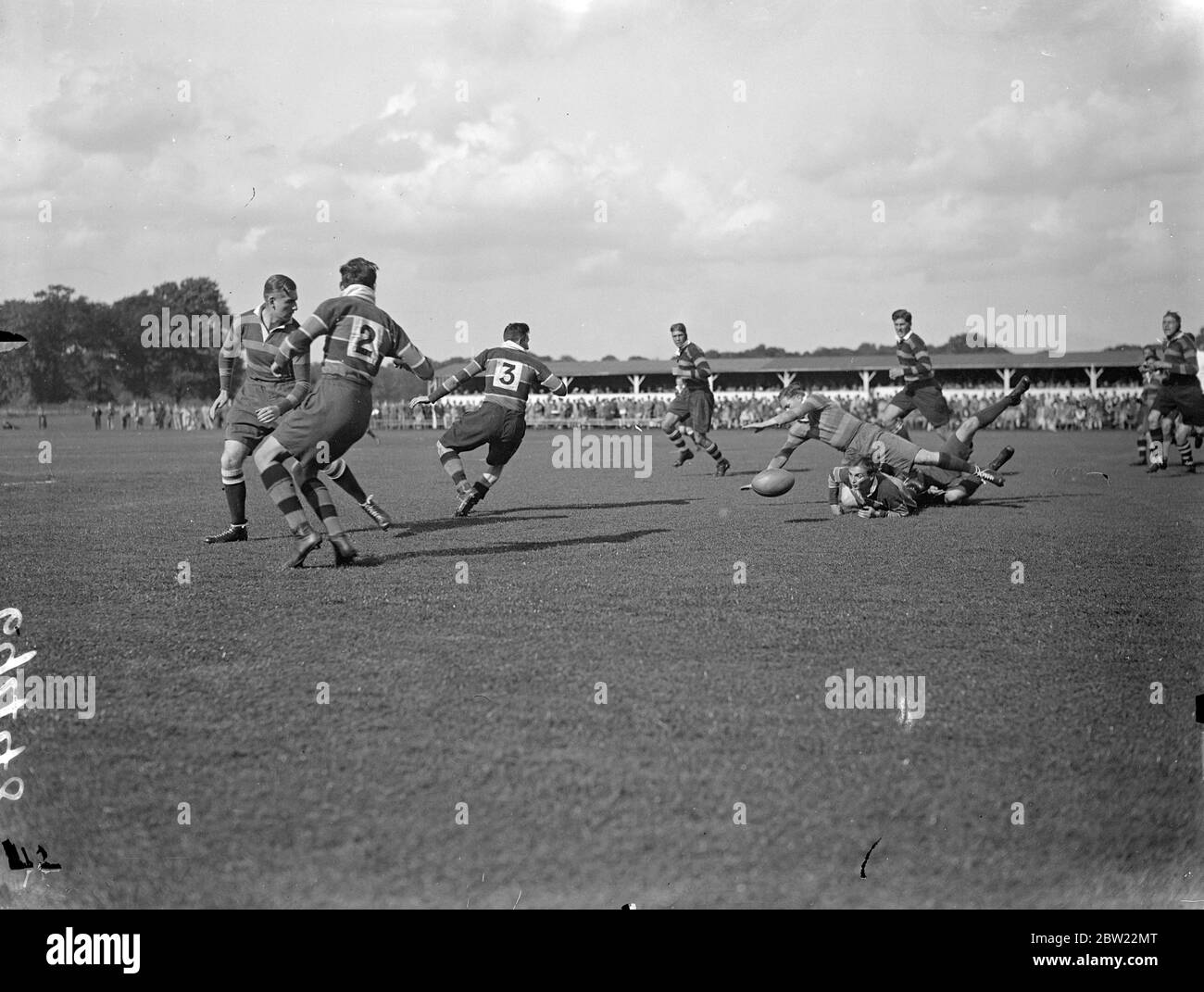 Richmond met Northampton in the first match of the new rugby season at Richmond athletic ground. Richmond player falls over Northampton man's back in the scramble for the ball. 18 September 1937. Stock Photo