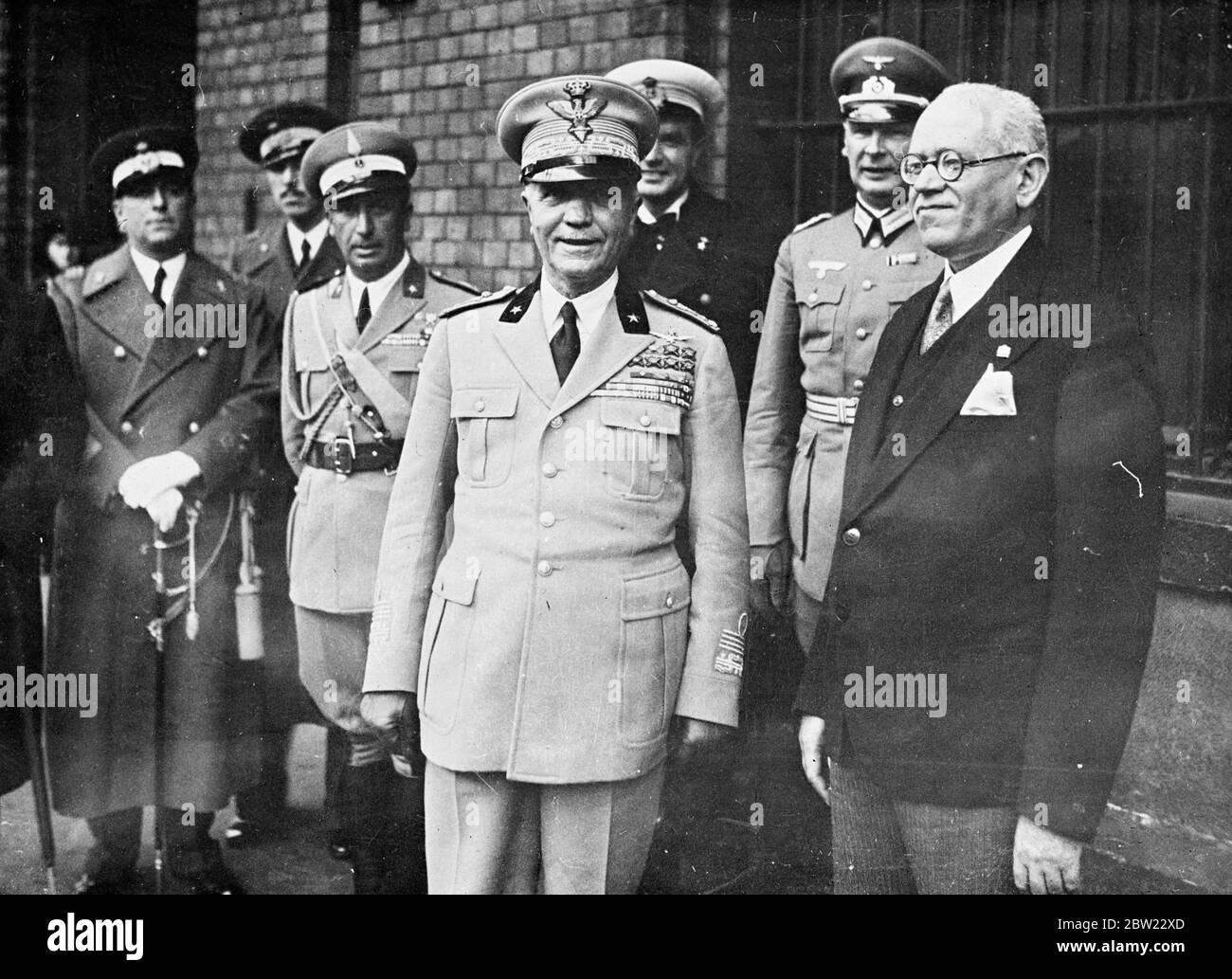 Marshal Badoglio, commander-in-chief of the Italian Army and conqueror of Abyssinia, arrived in Berlin to be the guest of German War Minister, Field Marshall von Blomberg at the German Army manoeuvres. The Marshall with Signor Attolico, the Italian Ambassador (right) on his arrival. 22 September 1937 Stock Photo