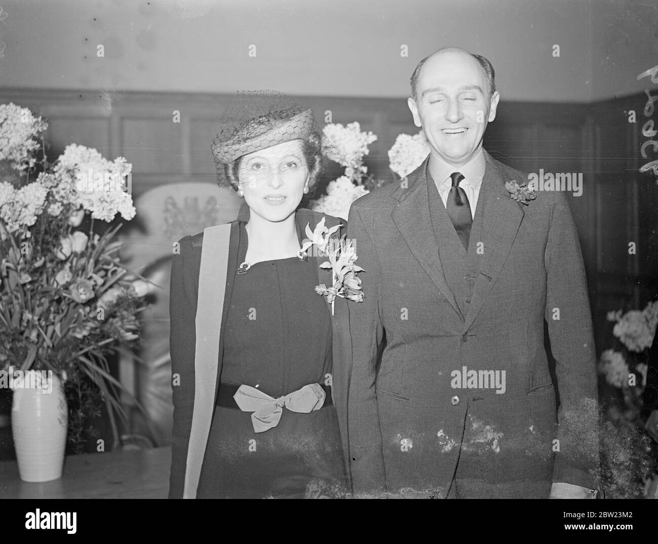 Alter their engagement had been kept secret until a short time before the ceremony, Mr Vyvyan Drury and Mrs Nina Soames, were married at Caxton Hall register office, Westminster, London. Seen here, leaving after the ceremony. 16 February 1938 Stock Photo