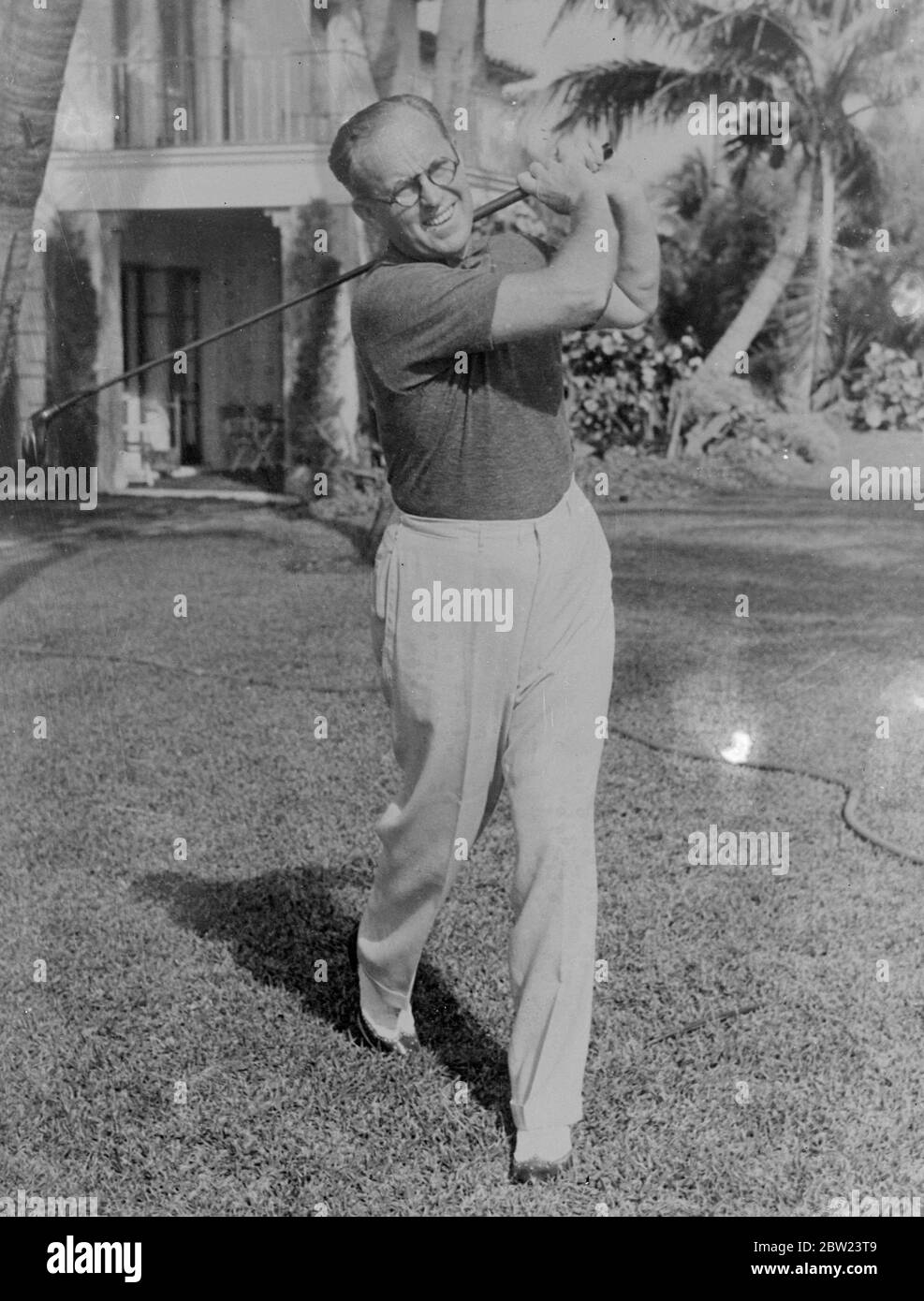 Mr Kennedy keeps in trim for London embassy. Mr Joseph P Kennedy, recently appointed as American Ambassador to London, in succession to the late Mr Robert Bingham, driving during a round of golf at the Palm Beach Country Club, Florida. He is expected to sail at the end of this month for England to take up his post. 14 February 1938 Stock Photo