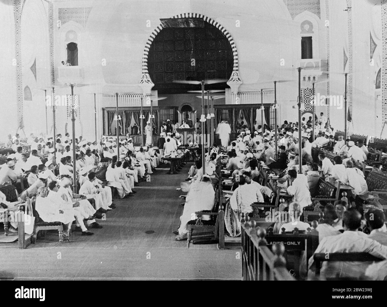 A general view of the opening session of the new Madras Legislative Assembly. The first meeting of the Madras Assembly since the Congress Party took office under the new Indian constitution. Sir William Wright , nominated by the governors , was in the chair and the assembly proceeded to the election of the president. The deadlock brought about by the first refusal of the Congress Party to take office under the new constitution was brought to an end when the party decided to cooperate. 22 July 1937 Stock Photo