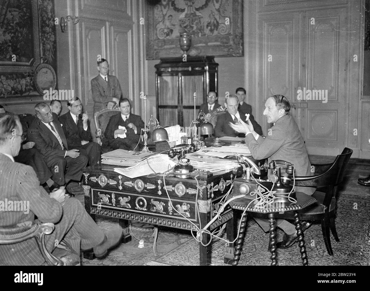 M George Bonnets , the French Finance Minister , making his statement to British journalists at his office in Paris about the drastic new measures, including new taxes and economies , which are being taken to solve the French financial crisis. 22 July 1937 Stock Photo