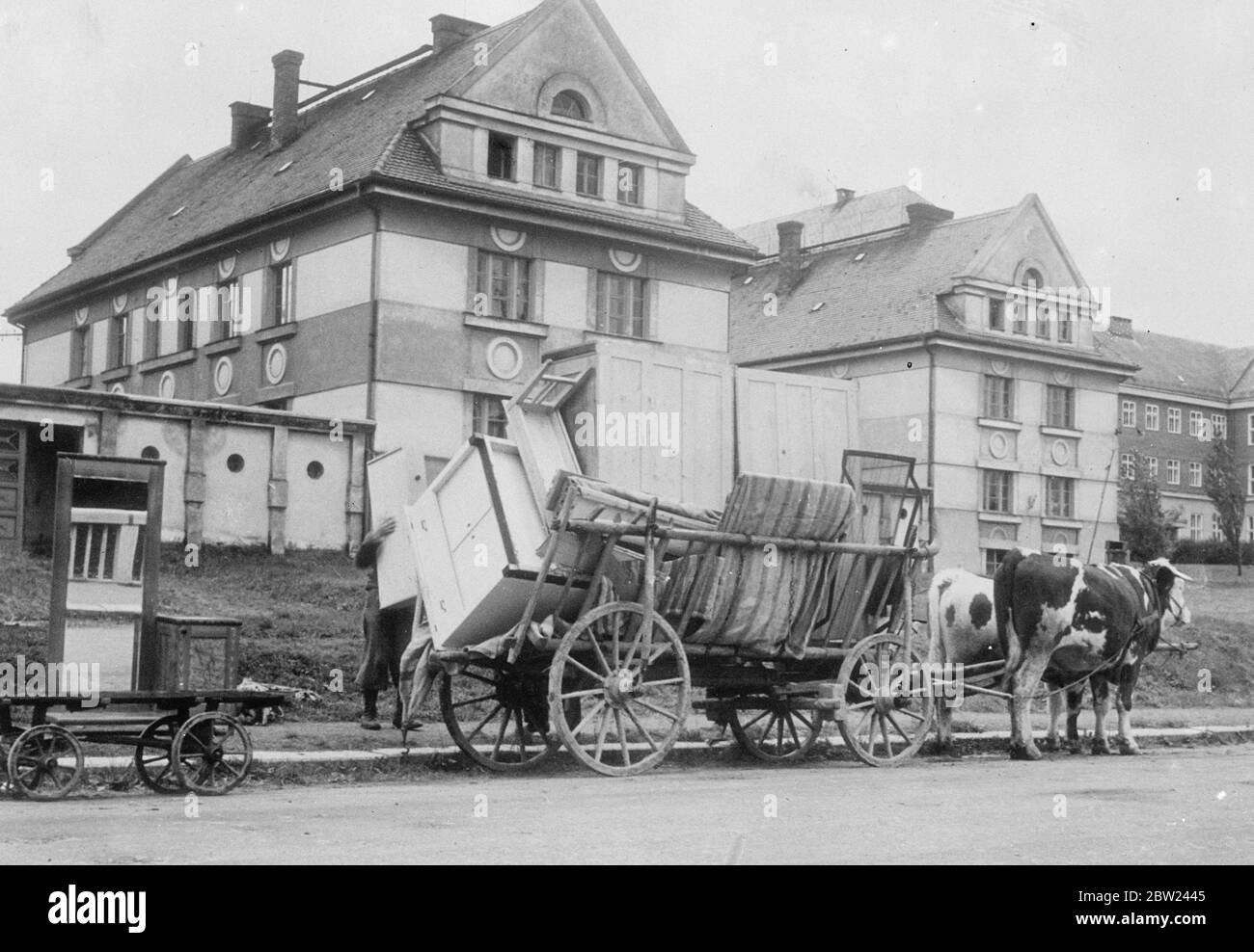 Politcka, the Bohemian town with 90% Czech population and only 2% German, has been taken over by the Germans under the Munich agreement. The town was founded in 1265 by King Premysl II. Photo shows: Possessions of an anti-Nazi refugee loaded onto a bullock cart at the farm as the family makes its escape before the entry of the Germans. 11 October 1938 Stock Photo