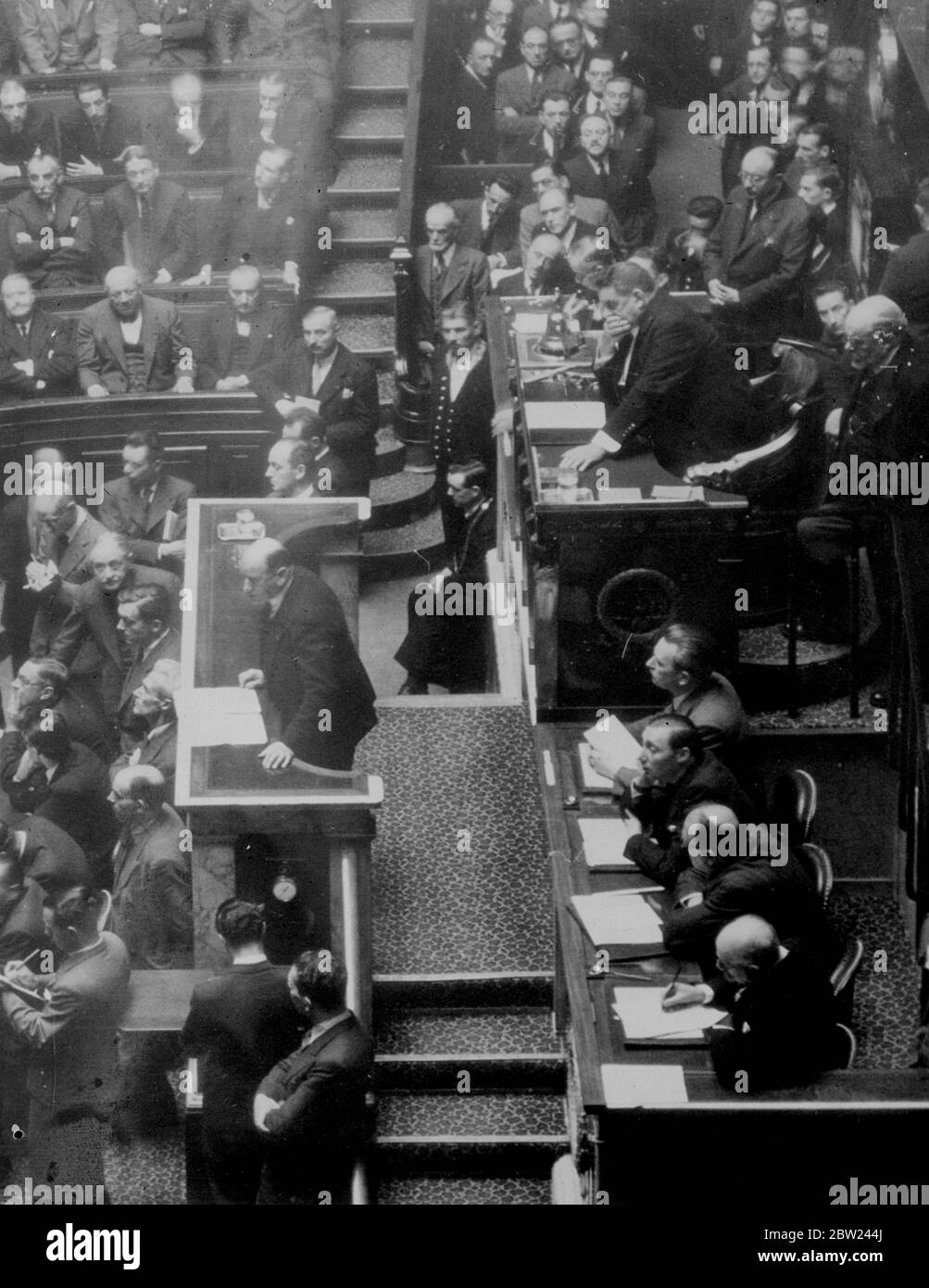 Mr Edouard Daladier, the French premiere, was given an overwhelming vote of confidence by the chamber of deputies following the debate on the Munich agreement on the Czech-German dispute. M Daladier said: I regret nothing. We choose peace. Photo shows: Edouard Daladier making his speech to the chamber. Behind him is M Edouard Herriot, the president. 5 October 1938 Stock Photo