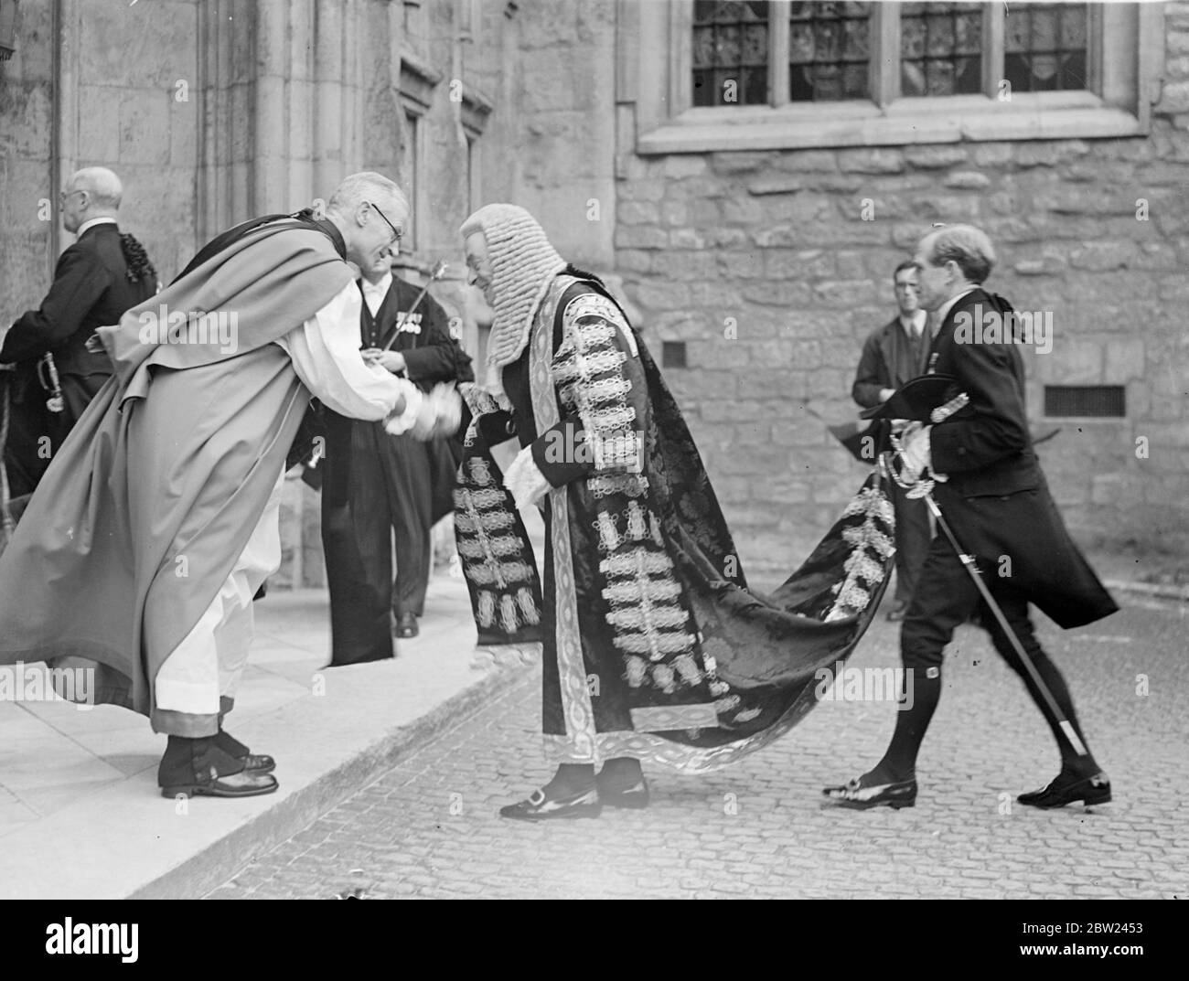 The Lord Chancellor, Lord Maugham, and his Majesty's judges, attend a special service in Westminster Abbey on the occasion of the reopening of the Law Courts after the long vacation. Photo shows: The Lord Chancellor, Lord Maugham, being received by the Dean of Westminster, the Rt Rev P F Delacour de Labilliere, at Westminster Abbey. 12 October 1938 Stock Photo