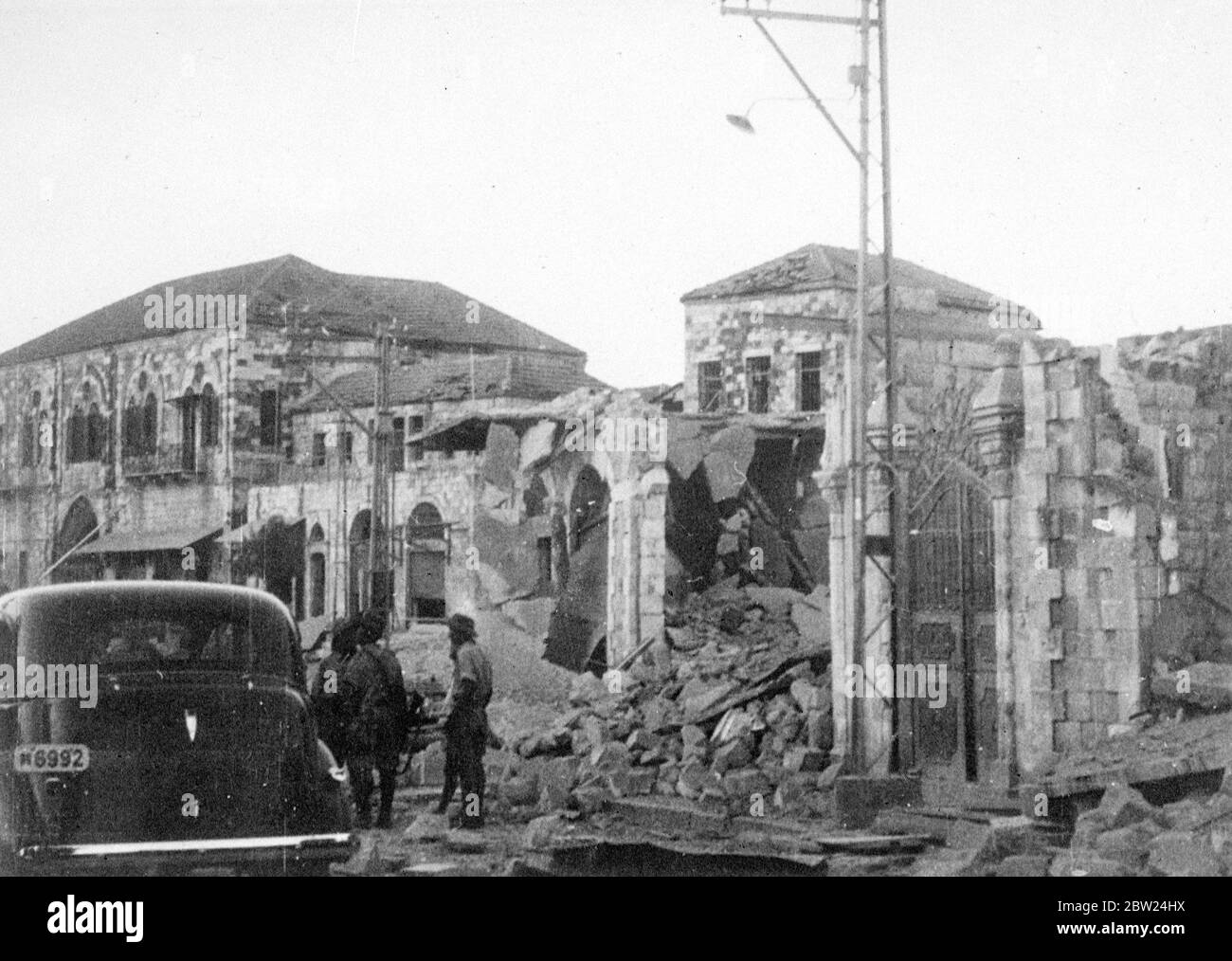 British troops, blow up 100 Arab houses in Palestine town. Royal Engineers dynamited over 100 Arab houses in Jenin, Palestine, following the murder by Arabs and Assistant District Commissioner Moffett of Jenin. The houses were destroyed, partly as a punitive measure against the inhabitants of the town having harboured Arab rebels and partly for reasons of security, houses in Jenin was built so close to one another that police and military patrolling was impossible. Photo shows,the ruins of Jenin. 5 September 1938 Stock Photo