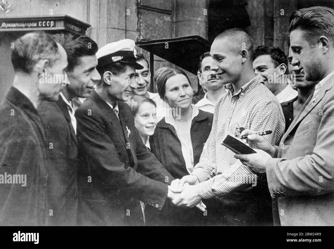 Whilst watching carefully the international situation, Russia is recruiting more men for her Army and Navy. It is understood that in the event of trouble over Czechoslovakia, Russia would fulfil obligations under the Soviet Czechoslovakia pact. Photo shows: Recruits being seen off by friends at in Moscow railway station. 12 September 1938 Stock Photo