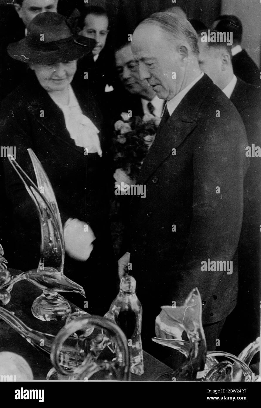 Lord Runcimantook brief relaxation from the strain of mediation in the Sudeten-German-Czechoslovak dispute when he visited Prague fair with Lady Runciman. Photo shows: Lord and Lady Runciman inspecting exhibits at the fair. 9 September 1938 Stock Photo