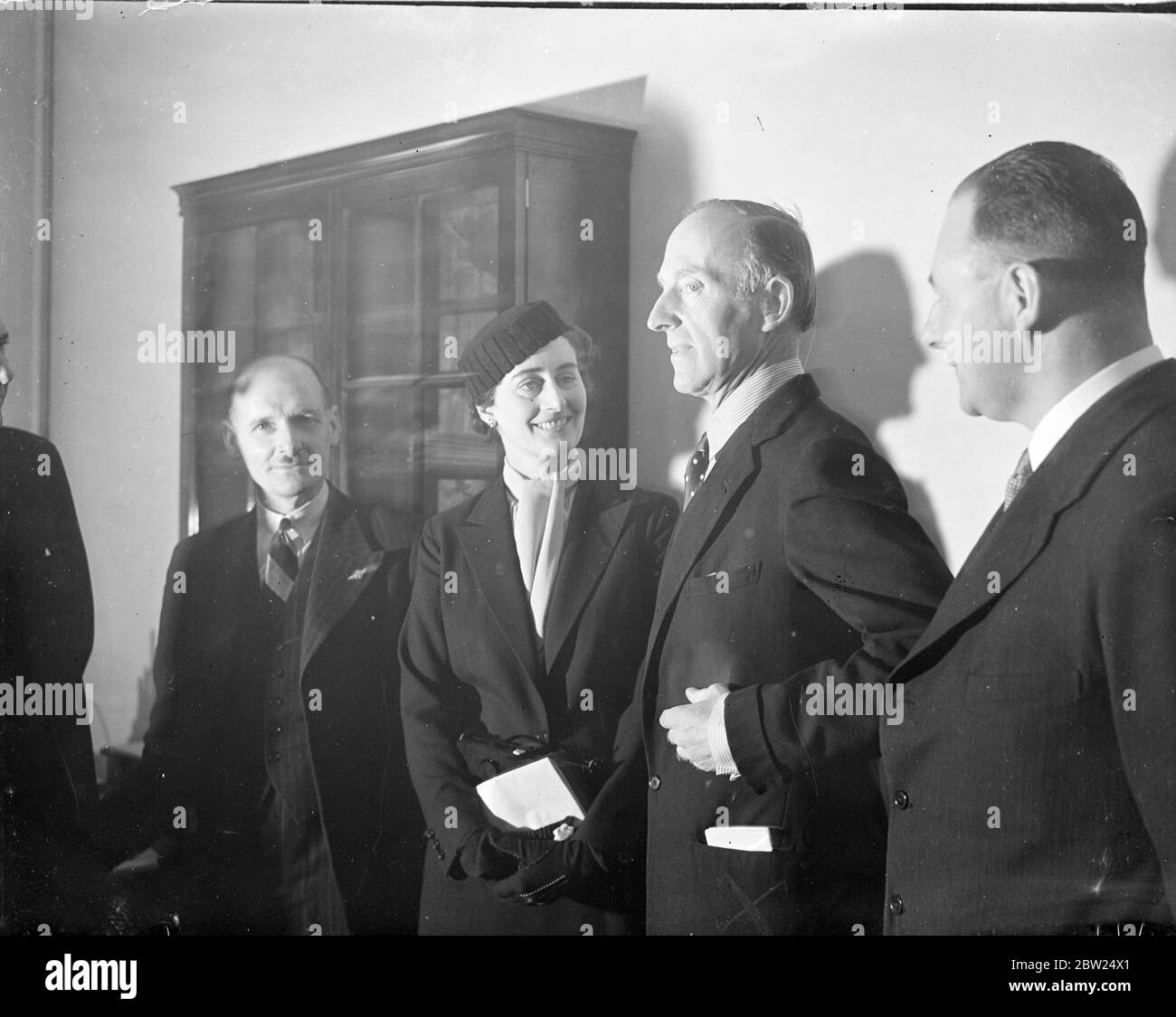 The first meeting of the newly appointed Commissioners of the Civil Air Guard took place at Ariel House, Kingsway. The various badges and uniforms to be worn by members of the Guard were discussed at the meeting. Photo shows, Mrs F G Milos, the only woman Commissioner, talking with Lord Londonderry, the Chief Commissioner, at Ariel House. 29 August 1938 Stock Photo