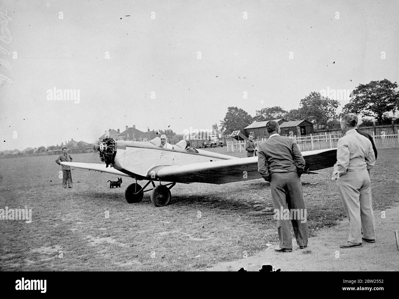 Two men take off from Southend in Â£10 plane to tour Germany. After spending months rebuilding and testing an aeroplane which they bought as a 'wreck' for Â£10, two members of Southend Flying Club, Mr Jim Myall and Mr Roper Brown, both of Southend, left Southend Airport for a two week tour of Germany. When they bought the aeroplane, a 40 hp Salmson Klemm , which is about 10 years old, it was in small pieces. It is now a worthy again, with a cruising speed of about 80 mph. Photo shows, the Â£10 machine before takeoff. 2 August 1938 Stock Photo