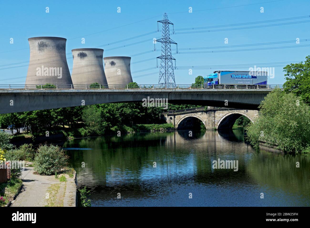 Ferrybridge Power Station, and old bridge built by John Carr, West Yorkshire, England UK Stock Photo