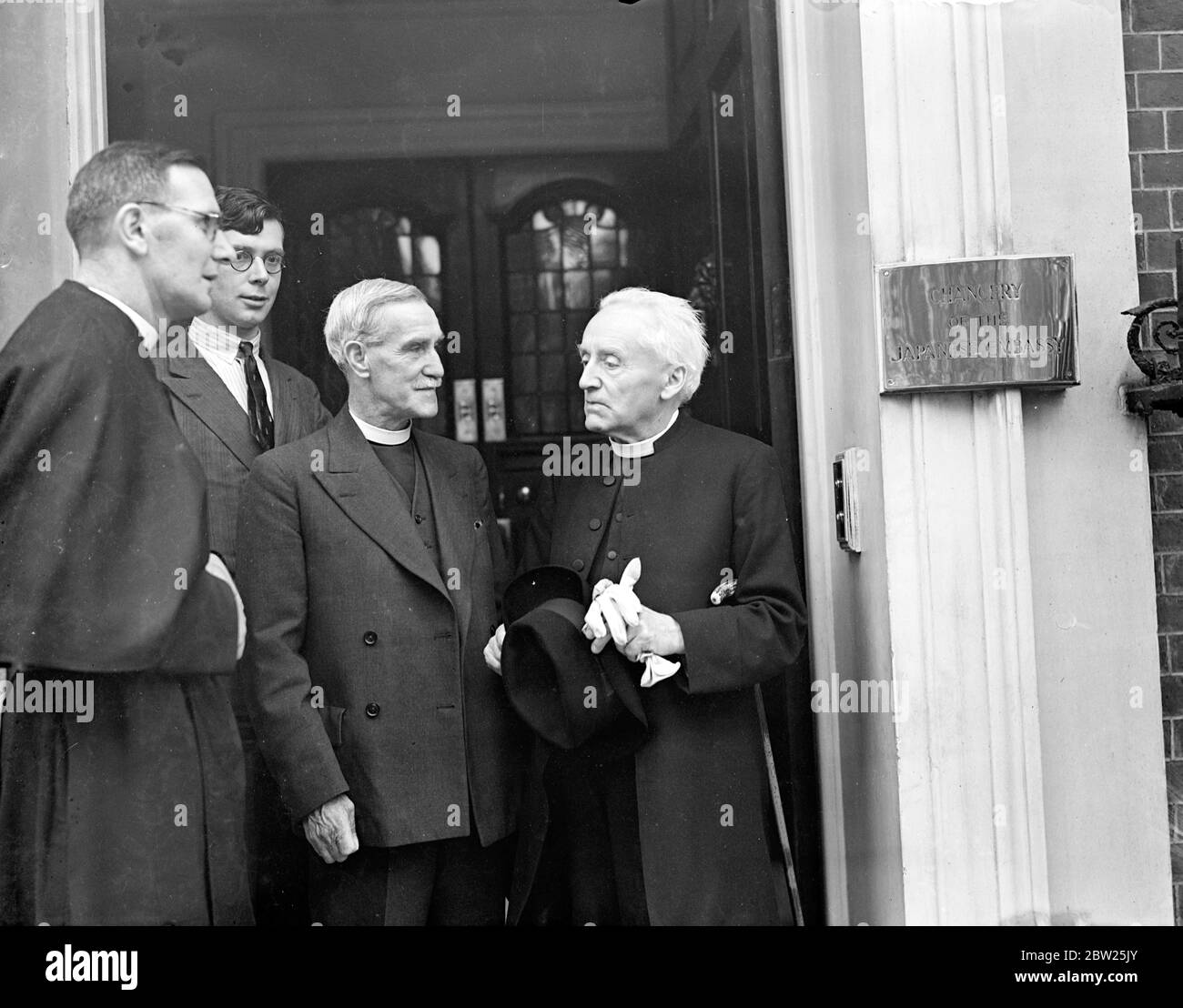 Clergy caller at the Japanese Embassy, protest against Canton bombing. A party of clergy led by the Canon Donaldson called at the Japanese Embassy in Portman Square to protest against the bombing of civilians in Canton. In addition to Canon Donaldson, there were the Rev E J T Bagnall, of the London Free Church Federation, the Rev H Cuthbertson and Mr C D Clagg. The party saw the First Secretary of the Embassy. A further deputation of clergy representing various denominations is to call at the embassy in a fortnight. Photo shows, lRev H Cuthbertson (right), talking with the Rev E J T Bagnall , Stock Photo