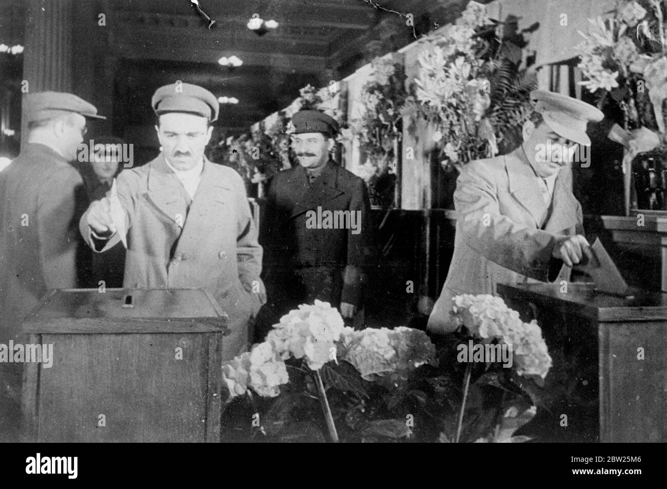Stalin votes in Supreme Soviet elections. On a day declared as a national holiday, all Russia went to the polls to vote for members of the Supreme Soviet, the Government of the USSR. The day was given over to national rejoicing and every town and village had its festival. Photo shows, Josef Stalin, Soviet 'dictator' and A Mikoyan casting their votes. Behind are V Molotov, K Voroshilov and L Kaganovich. They are voting in the Lenin election district in Moscow. 1 July 1938 Stock Photo