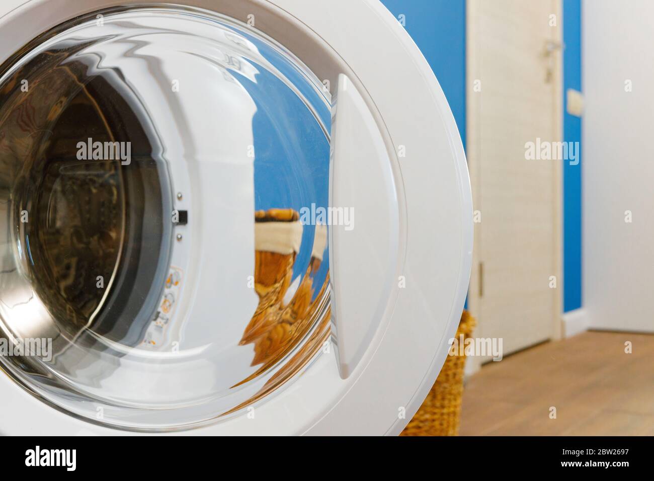Turning on washing machine close hi-res stock photography and images ...