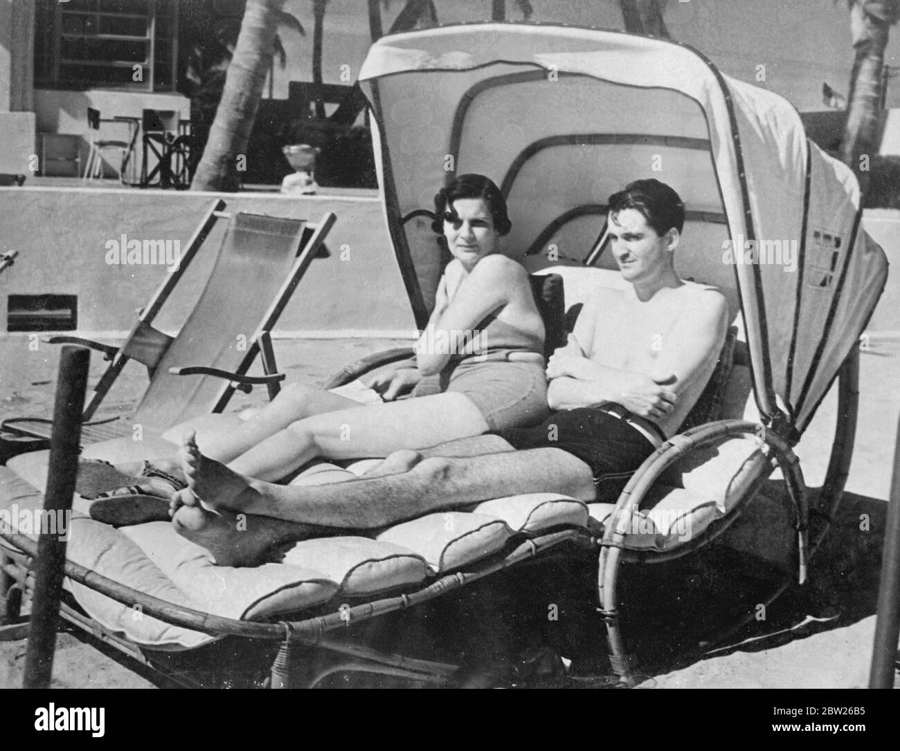 Lord and Lady Weymouth holidaying at Miami. Lord and Lady Weymouth sun bathing on the beach at Miami, Florida, where they are spending a holiday. Lady Weymouth is the son of the Marquis of bath. Lady Weymouth is the eldest daughter of Lord Vivian. 6 February 1938 Stock Photo