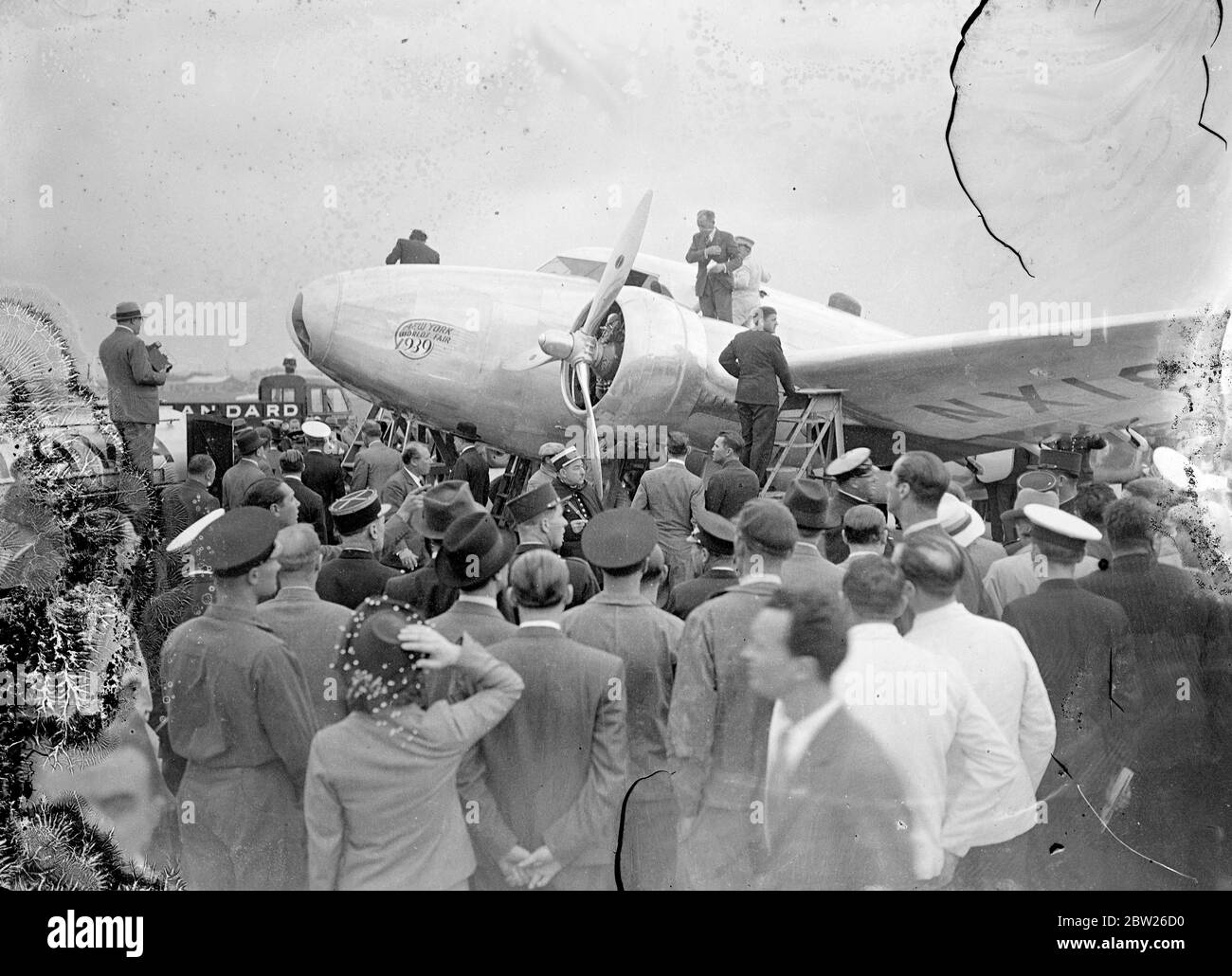 Howard Hughes sets New York to Paris record round world flight. Only 16 ...
