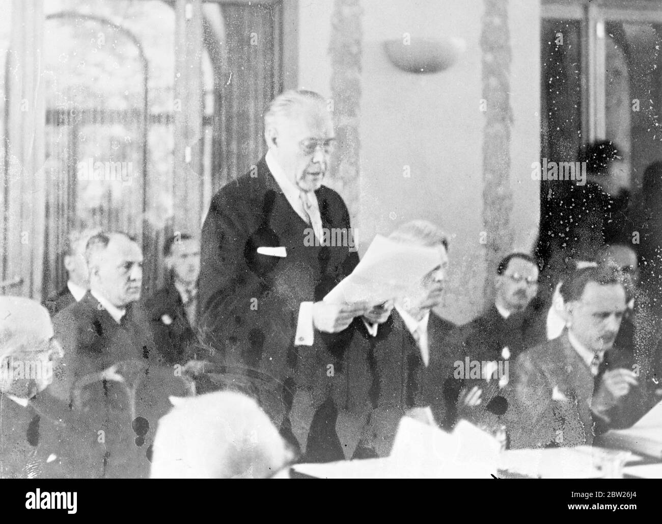 Nation seek solution of Refugee problem at Evian. American delegate's speech. Thirty nations are in conference at Evian las Baines, France, in an effort to find a solution to the problem of the thousands of refugees, mainly Jewish, who are leaving Germany. Photo shows, Mr Myron C Taylor, the American delegate, addressing the conference. 7 July 1938 Stock Photo