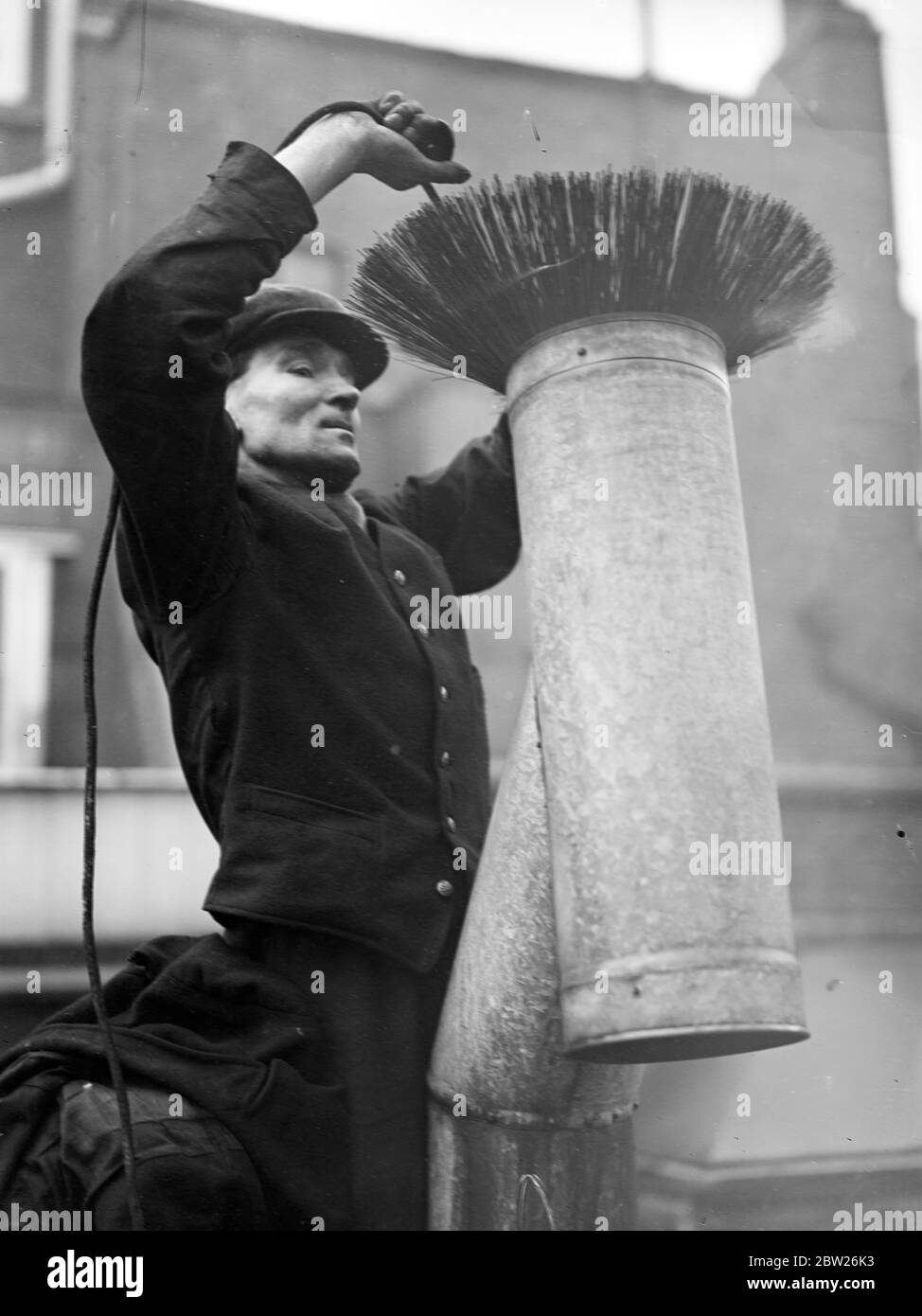 A Day in the life of a chimney sweep. A chimney sweep places his lines