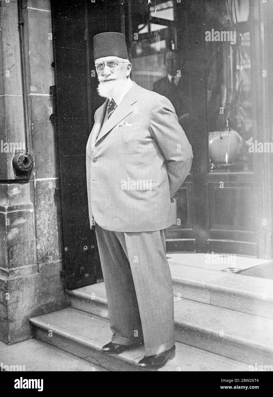 Ex Sultan of Turkey in Paris. The ex Sultan Abdul Medjud II of Turkey is at present on a visit to Paris. The ex Sultan is a noted amateur painter. Photo shows, ex Sultan Abdul Medjud leaving his hotel in Paris. 11 July 1938 Stock Photo