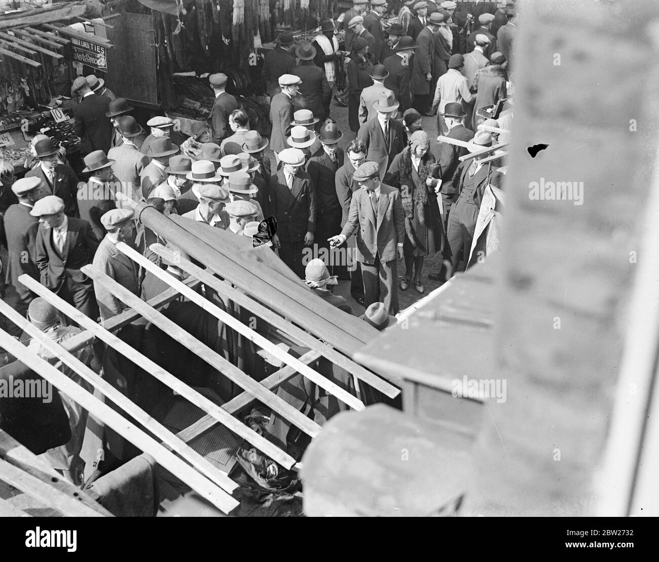 Petticoat Lane Market crowded with shoppers and traders. 1933 Stock Photo