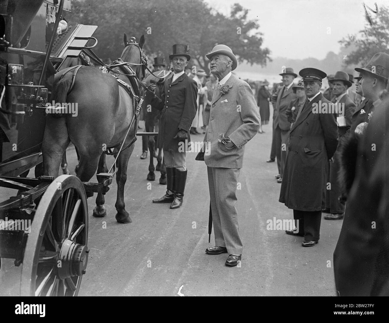 Sir Walter Gilbey, Hyde Park's dress expert at the meeting of the members of the Coaching Club held in Hyde Park for a drive to the Ranelagh Club for the luncheon. 26 June 1937 Stock Photo