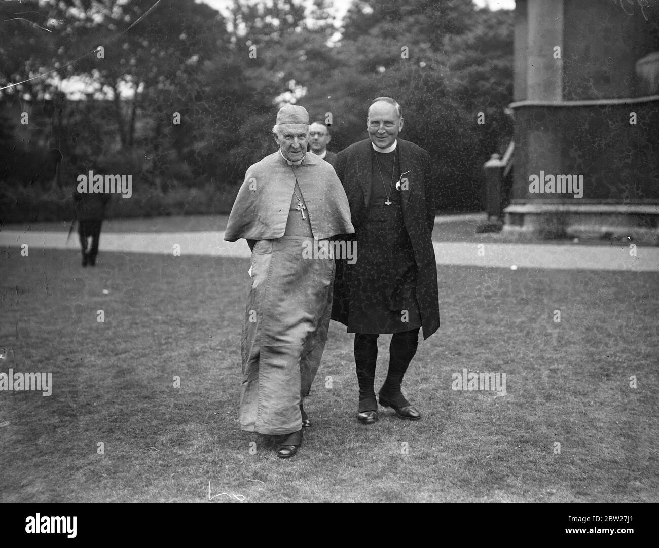 The Archbishop of Canterbury Dr Cosmo Gordon Lang, gave a reception to missionaries at Lambeth Palace. The Archbishop walking with the Bishop of Guildford. 29 June 1937 Stock Photo