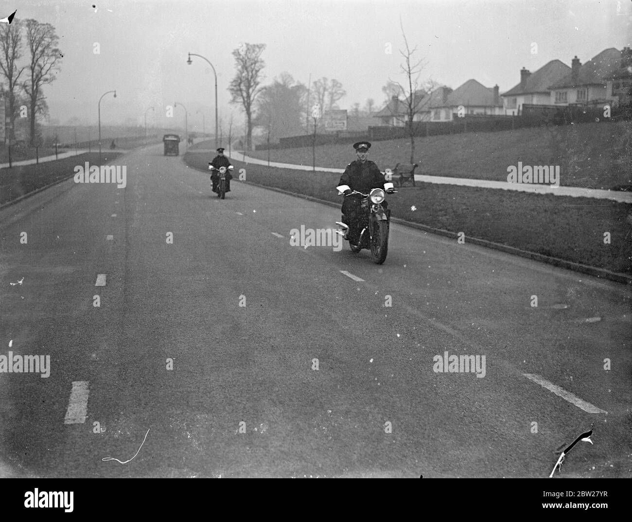 Motor cycle speed police on the Brighton Road. Stock Photo