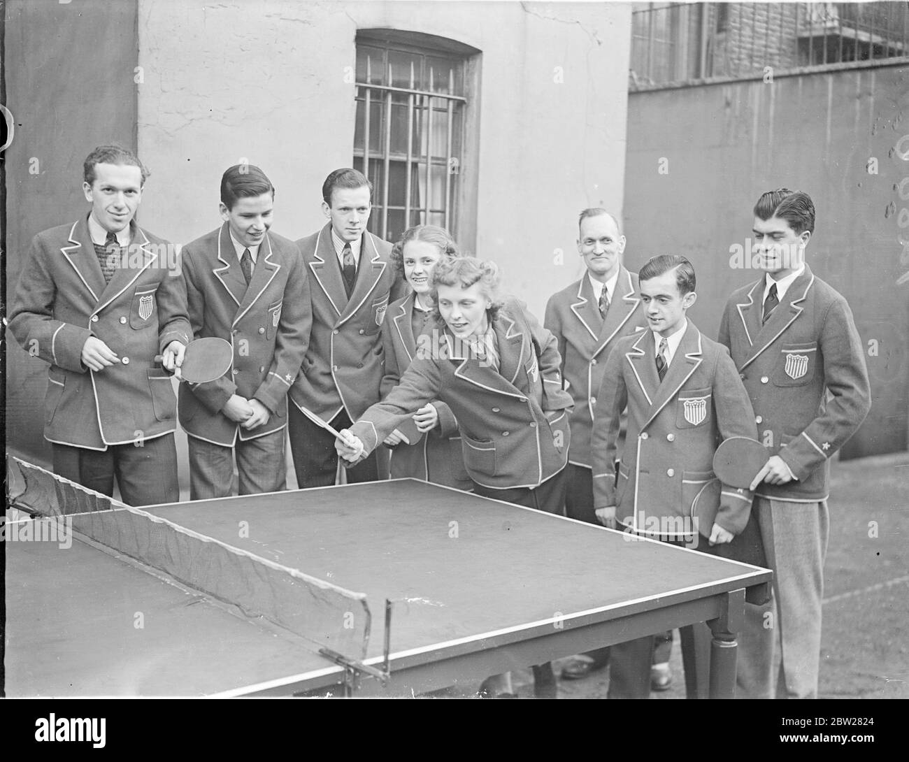 American table tennis girls practice immediately after arrival in London.  Only a few hours after their arrival from the United States, members of the American  team were practising at their London hotel