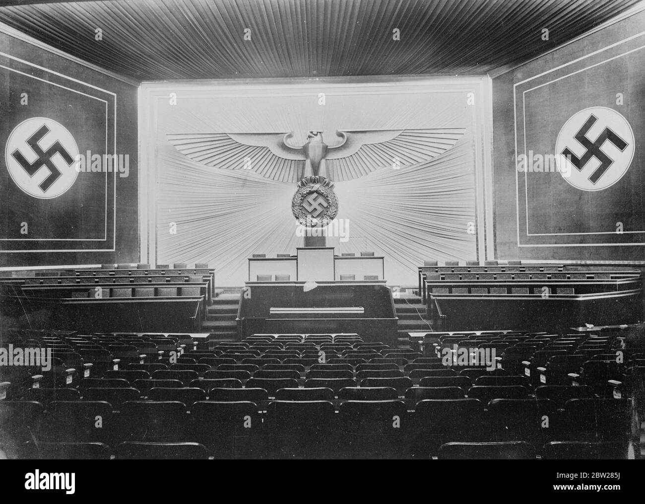 Where Hitler will make momentous speech to Reichstag. The Kroll Opera House in Berlin, ready with Nazi swastikas and German Eagle, prominently displayed, for the meeting of the Reichstag tomorrow (Sunday) . When Hitler is expected to make an announcement of the Austrian coup. 19 February 1938 Stock Photo