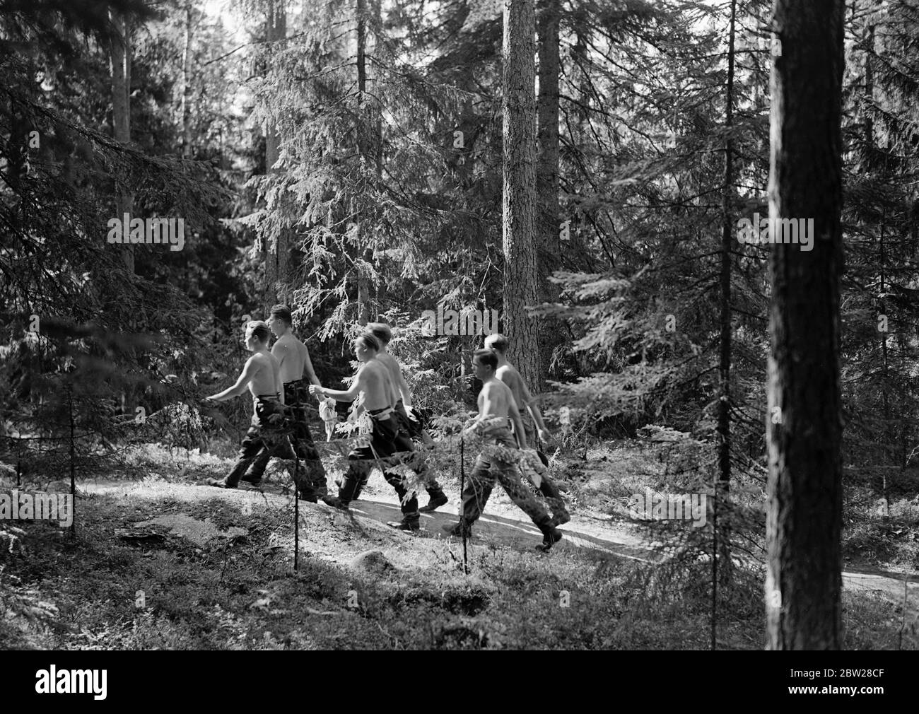 Worlds greatest foresters. Finland - Finnish daily life Forest Academy of  Korkeakoski 1939 The healthiest job in the world is forestry work. Six of  the students march to their assignment. Discipline is
