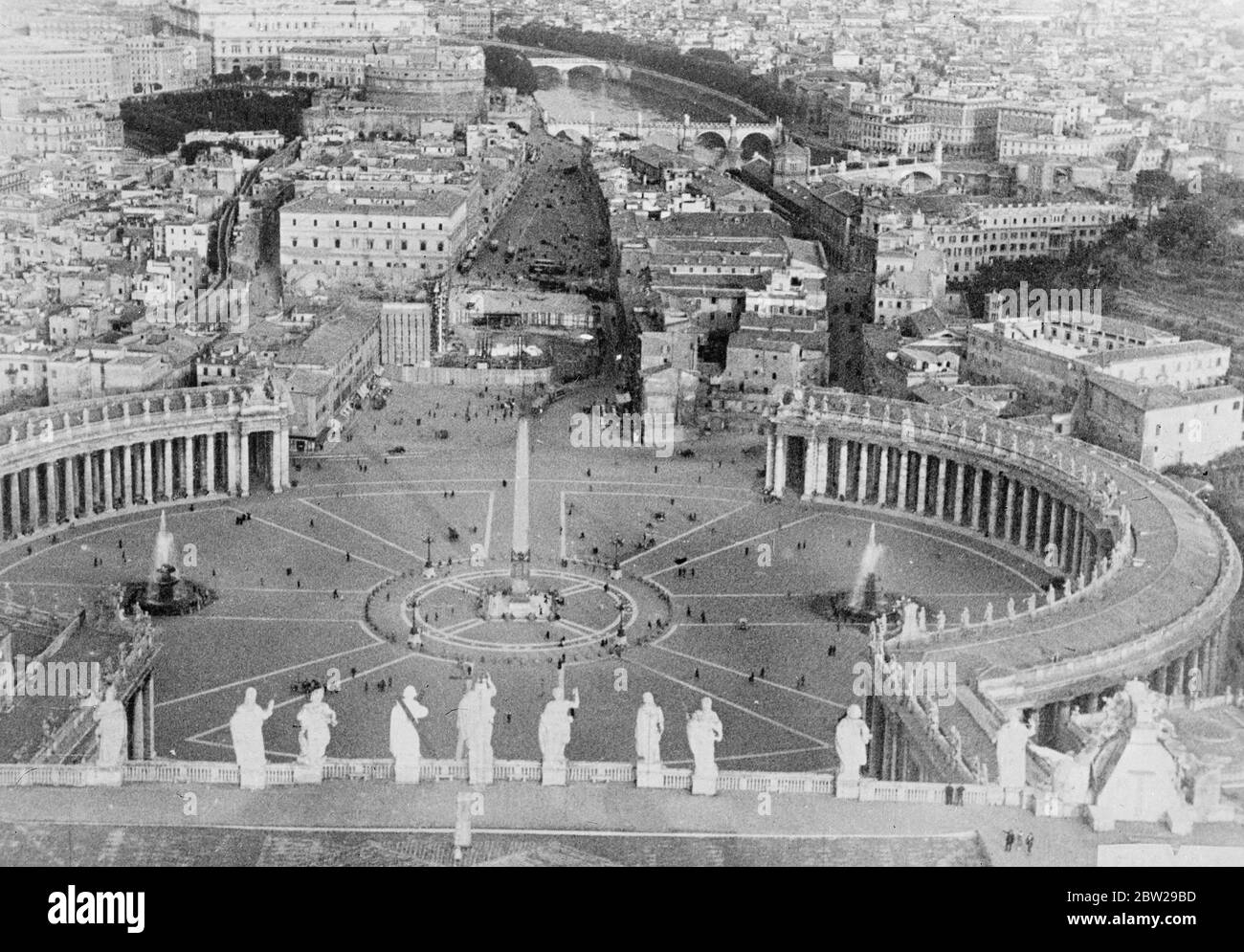 New glories for the 'Eternal City'. A new panorama of Rome, seen from the copula of St Peter's. Below is the Piazza S Pietro and the broad thoroughfare leading out of it is Rome's greatest improvement. It was made by the demolition of the famous Spina di Borgo, the disappearance of many buildings converting to Street into one. The great new artery gives direct connection between the Piazza S Pietro Andover Castel S Angelo district. 18 October 1937 Stock Photo