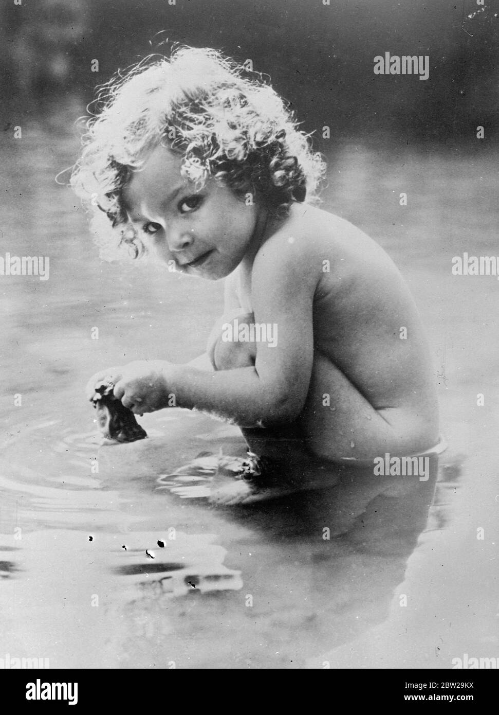 America's finest child study made by amateur photographer. This charming natural Child study, taken by Edgar T Clewell, a machinist of Allentown, Pennsylvania, whose hobby is photography, won the two major awards and a total of Â£300 in a national competition organised throughout the United States. 13 November 1937 Stock Photo