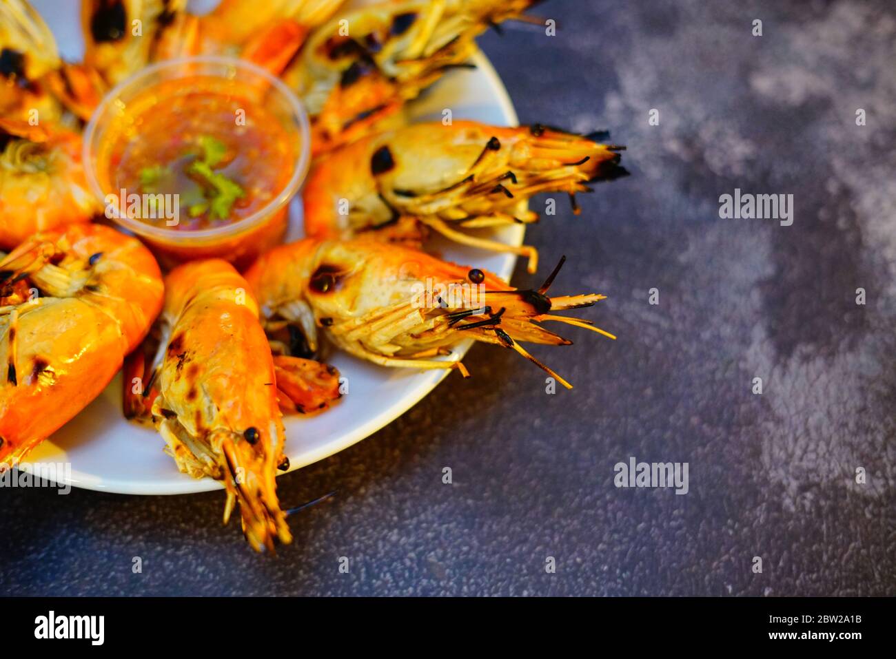 Grilled shrimp (Giant freshwater River prawn) grilling with charcoal at