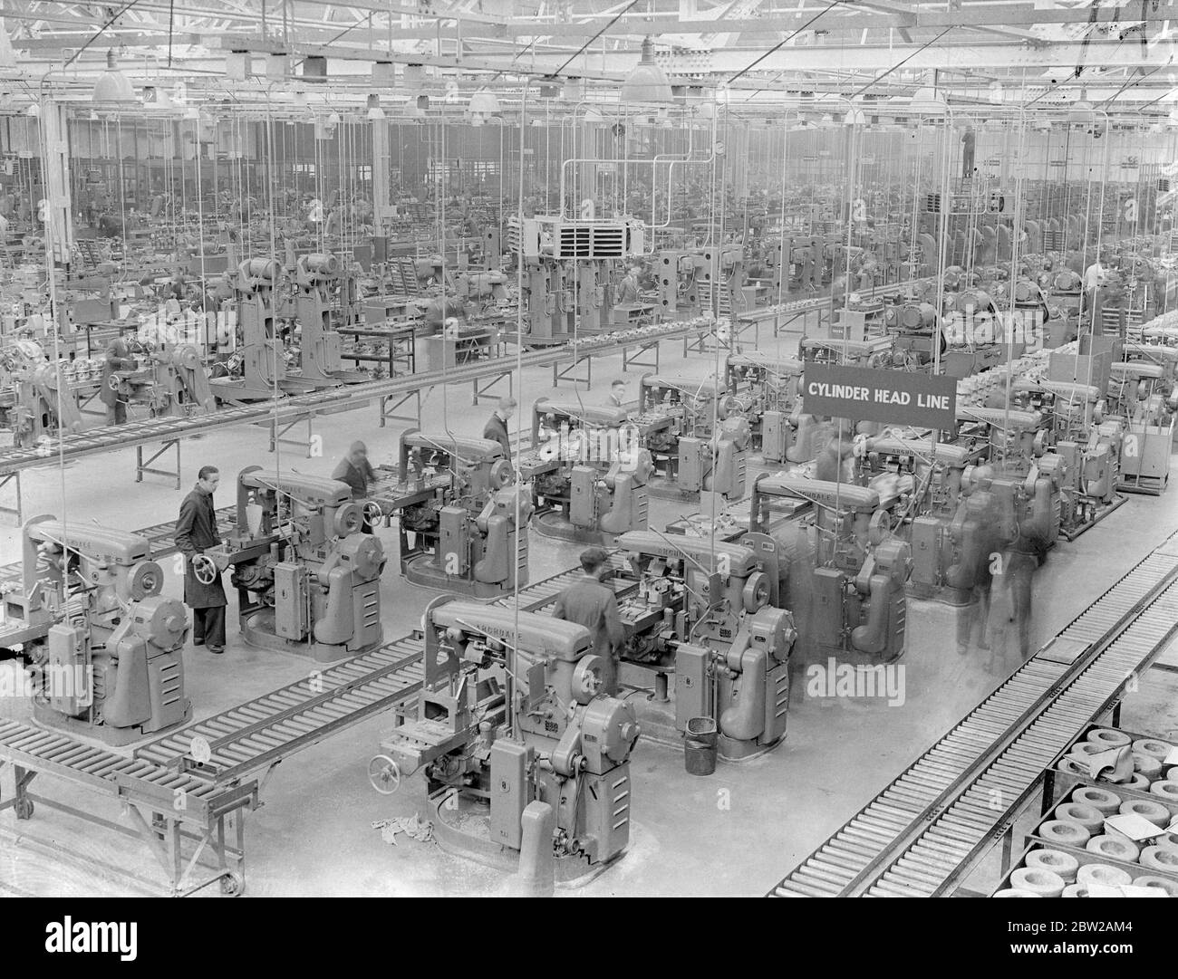 'Shadow factories'silent allies of Britain's Air Force. This series of pictures is the first ever made in Britain's 'shadow factories'the centres organised among motor manufacturers throughout the country to aid the Royal Air Force expansion scheme. Less than a year ago the 'shadow factories'were only an idea, but now high-speed work has established buildings on Marstons and given a valuable ally to the aircraft industry. Photo shows, a general view of the aero engine assembly shop at the standard 'shadow'factory at Coventry. 26 October 1937 Stock Photo